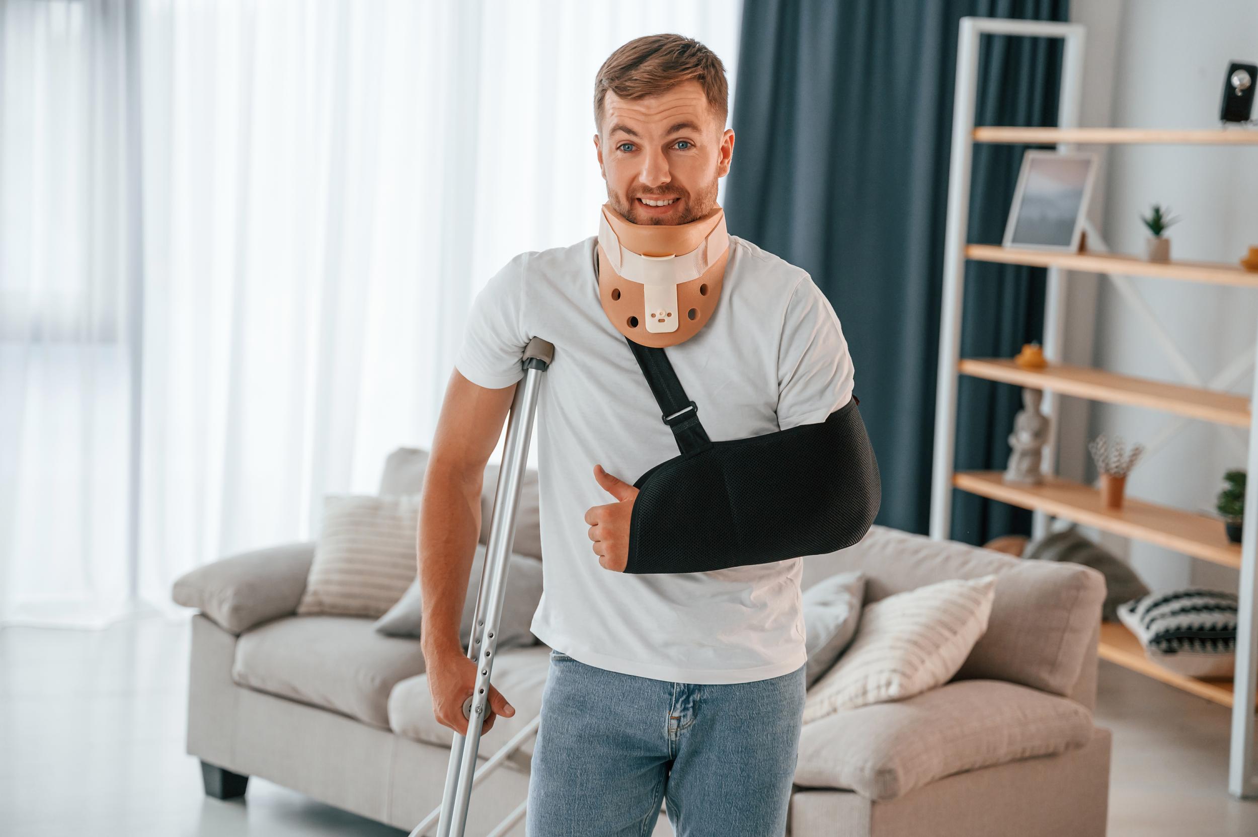smiling-man-wearing-medical-supports-stands-in-liv-2026-09-22-03-04-53-utc.jpg