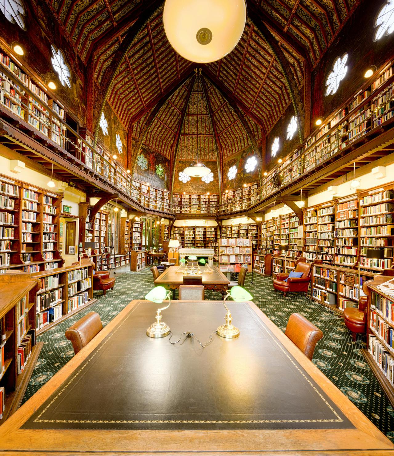 Explore the intricate and historic interior of Oxford Union Library, a renowned literary hub in England.
