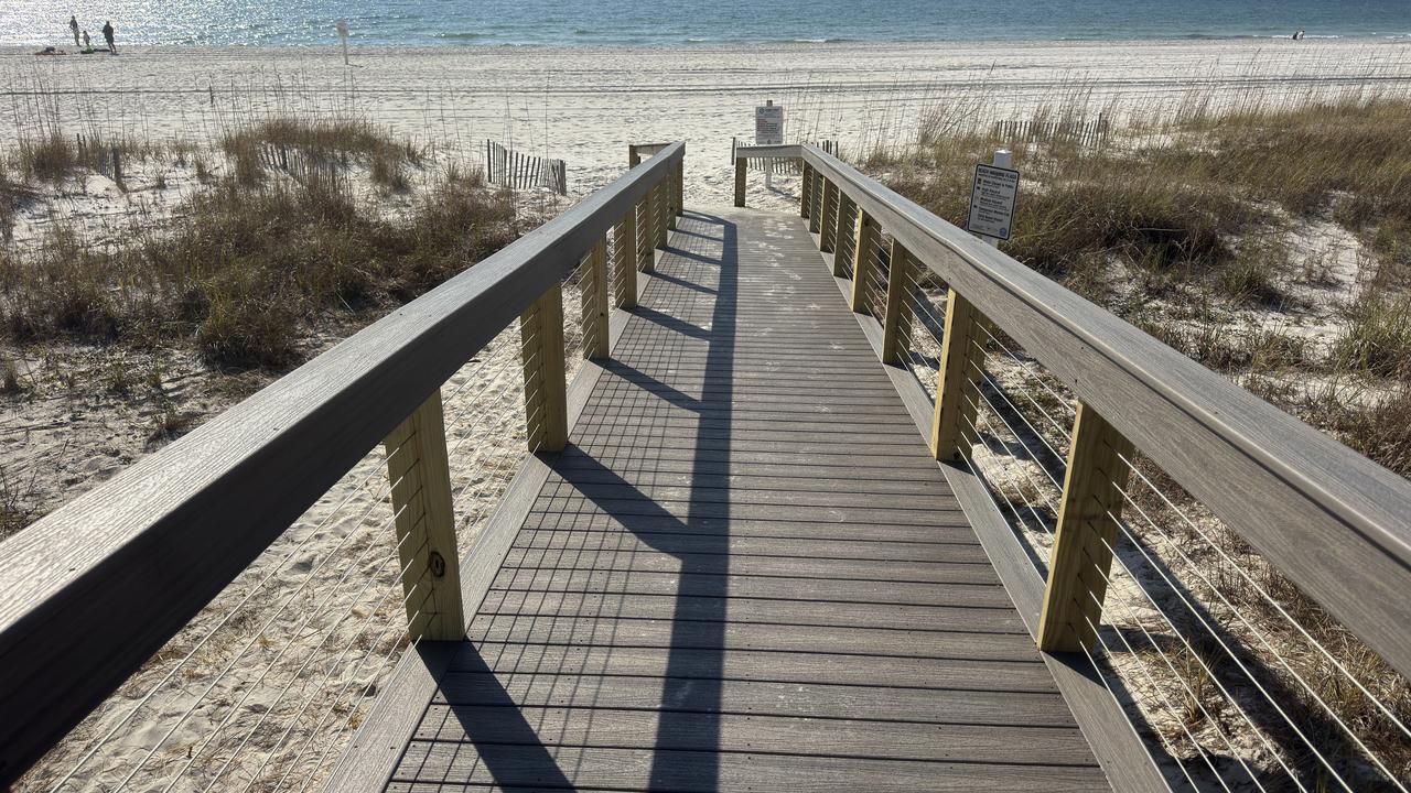 Gulf Shores composite boardwalk with cable railing and composite handrails