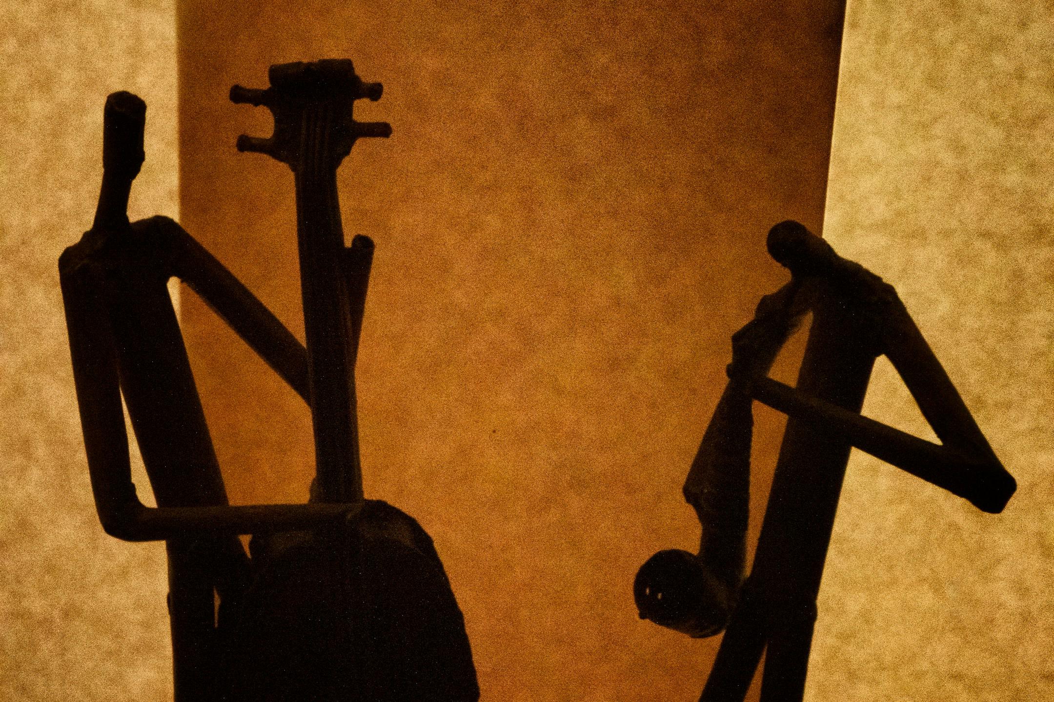 Jazz sculptures in silhouette.