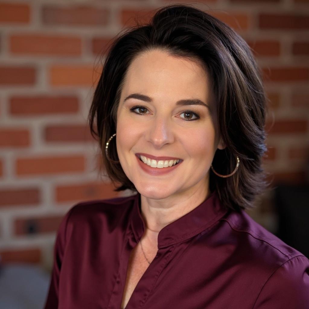 rebe headshot for web.jpeg