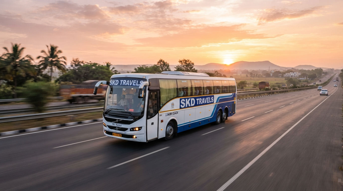SKD Travels luxury tour coach on an Indian highway at sunrise