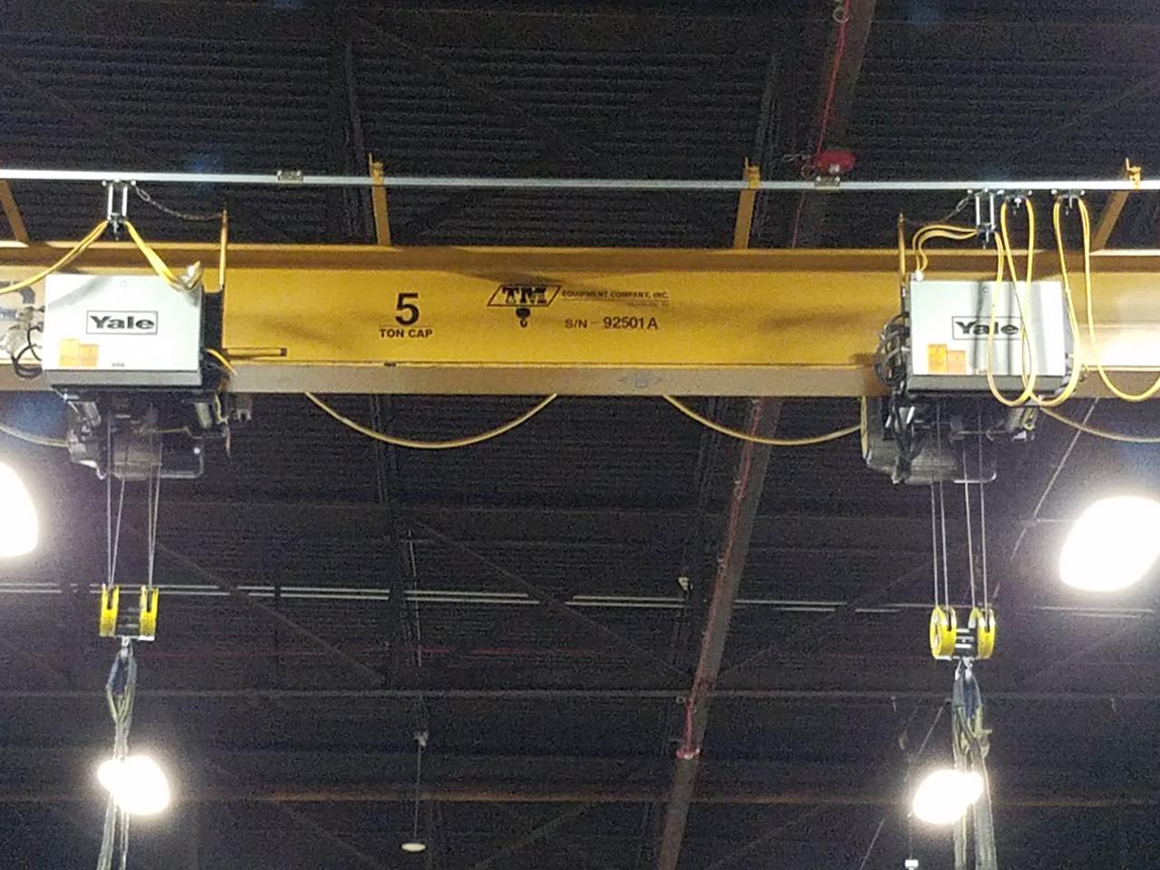 A crane in a warehouse.