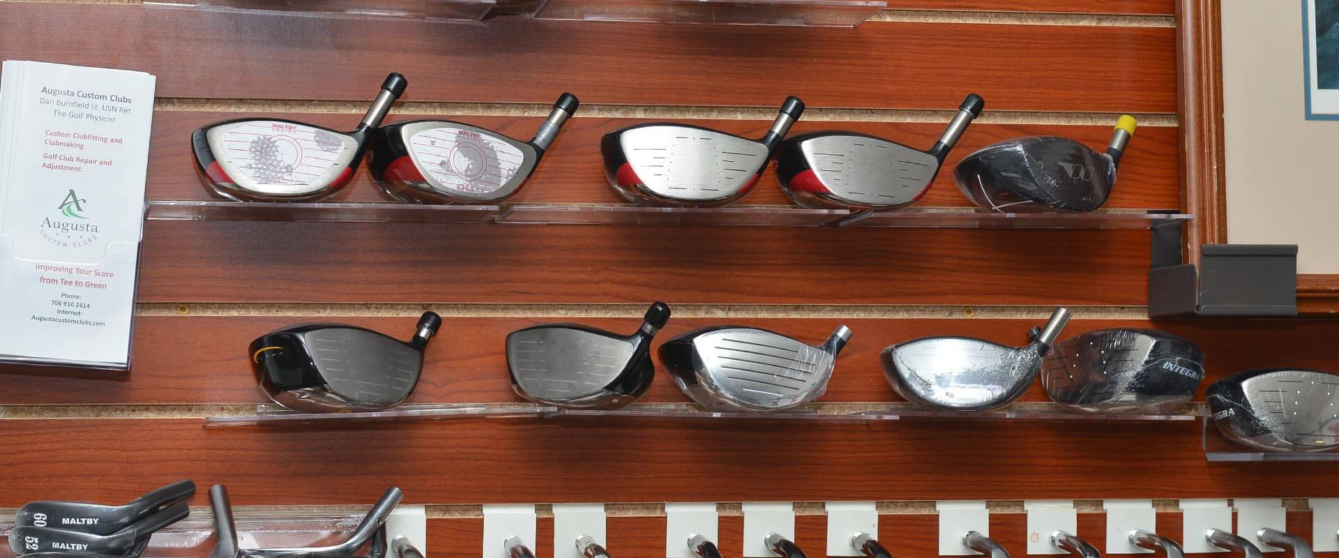 Driver and fairway wood heads on display at Augusta Custom Clubs