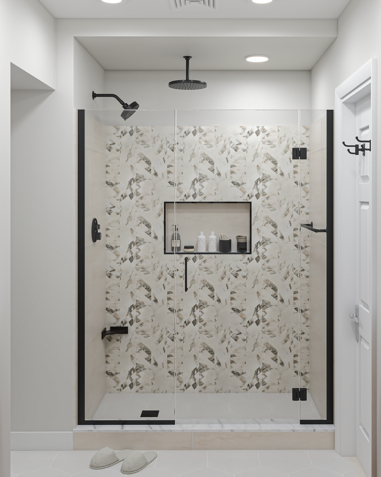 Shower with patterned marble accent wall and black fixtures