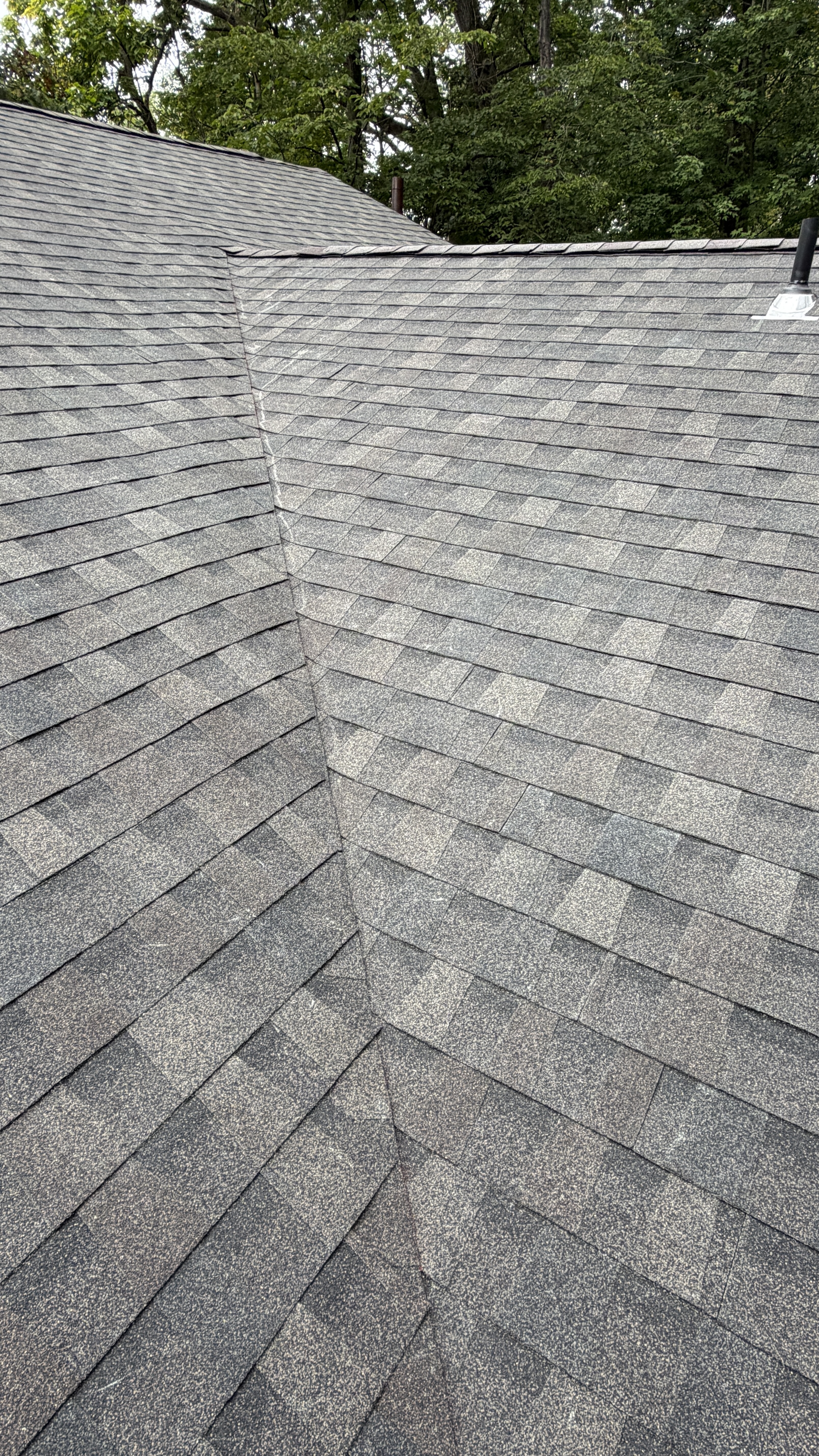 Completed shingle installation showing Midnight Mesa color and texture