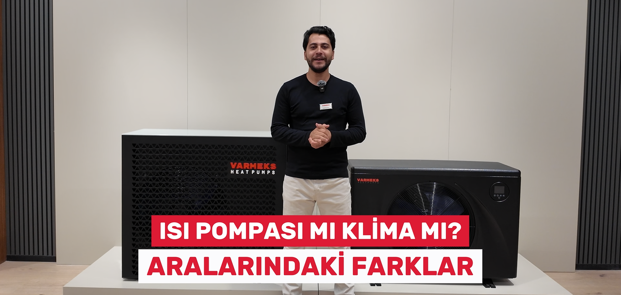 Varmeks heat pump and air conditioner comparison – person explaining in front of the devices