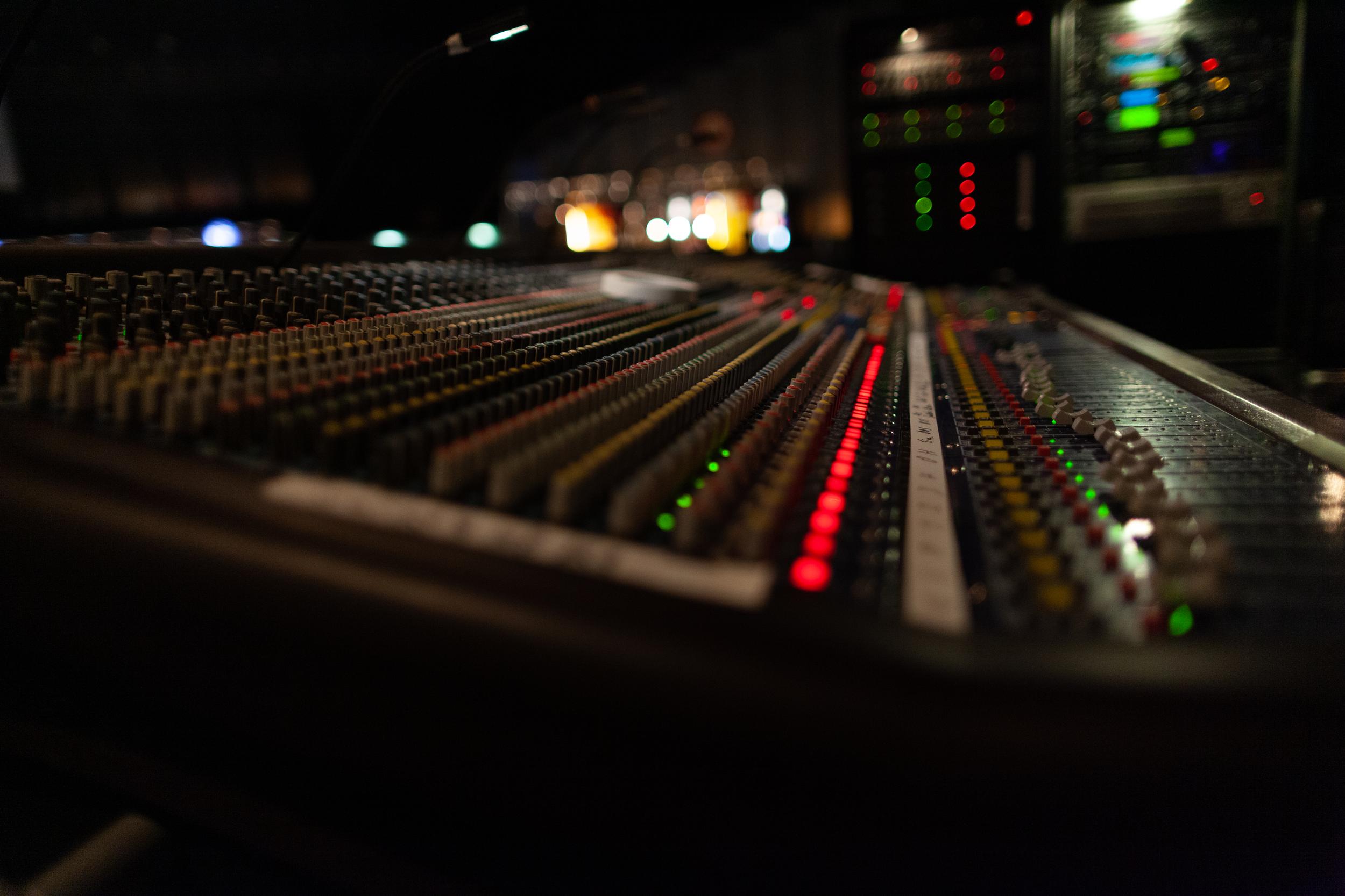 audio-mixing-console-with-glowing-buttons-in-dark-2026-03-19-09-28-55-utc.jpg