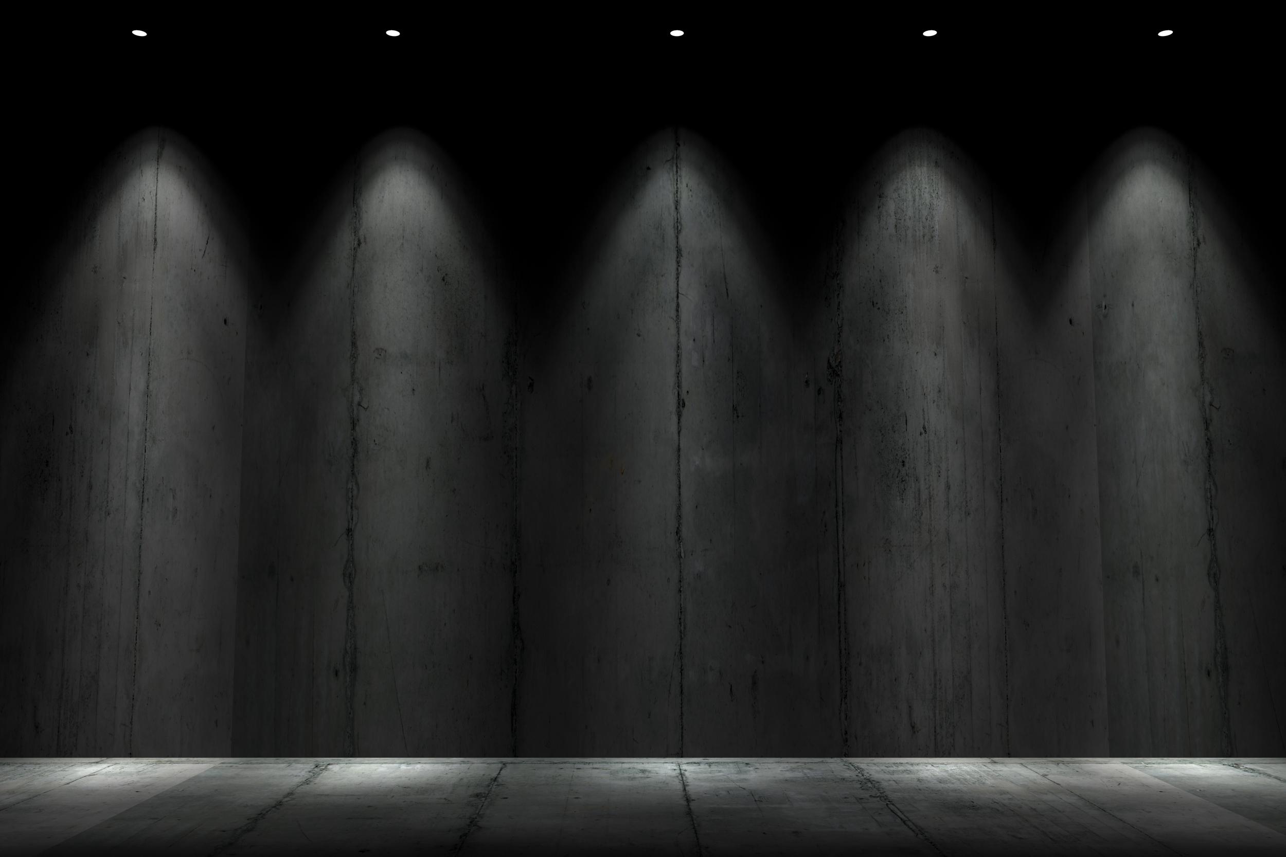 abstract-dark-room-with-spotlights-on-wall-2026-01-08-23-44-40-utc.jpg