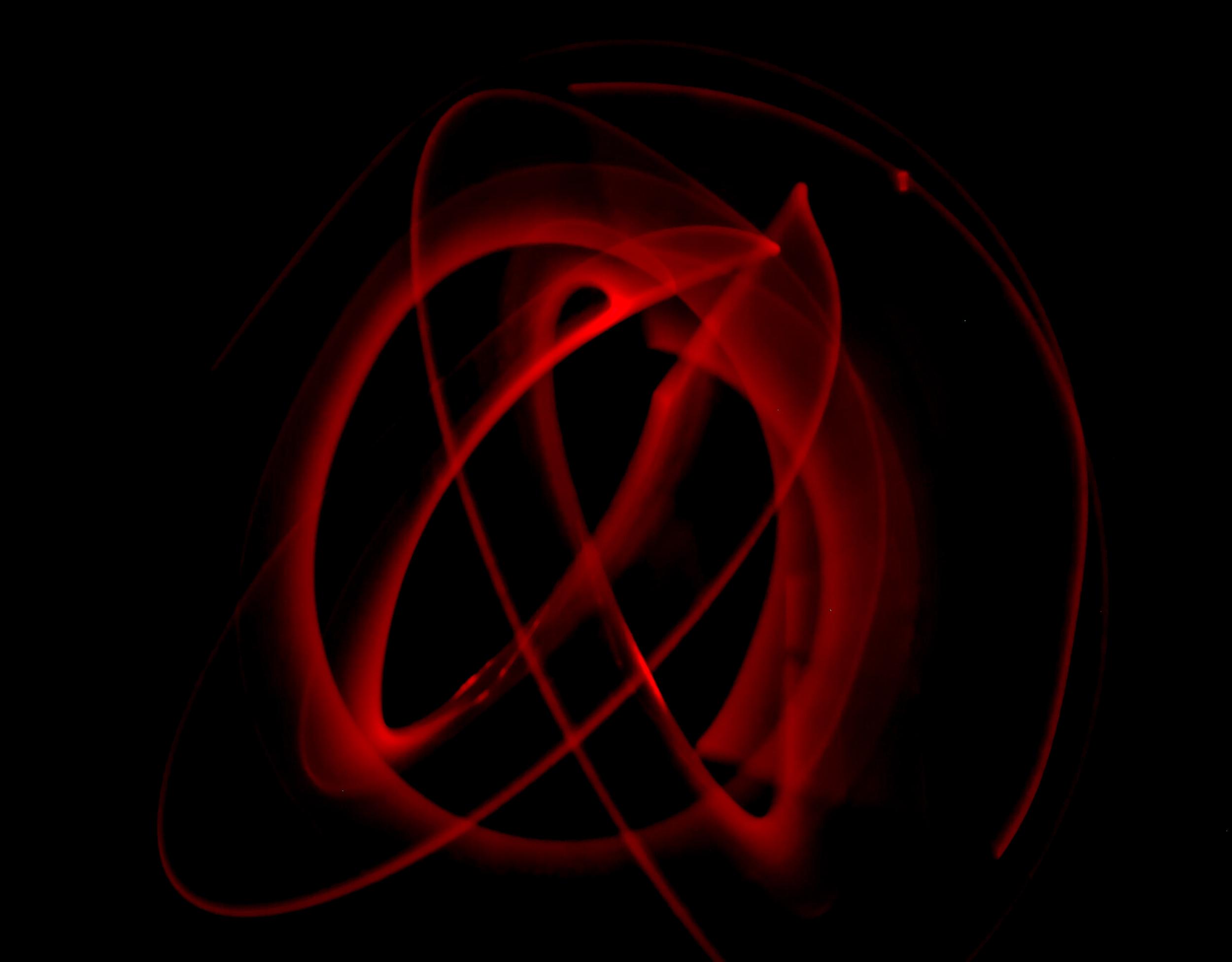 abstract-red-light-streaks-against-a-dark-backdrop-2026-01-06-09-59-40-utc.jpg