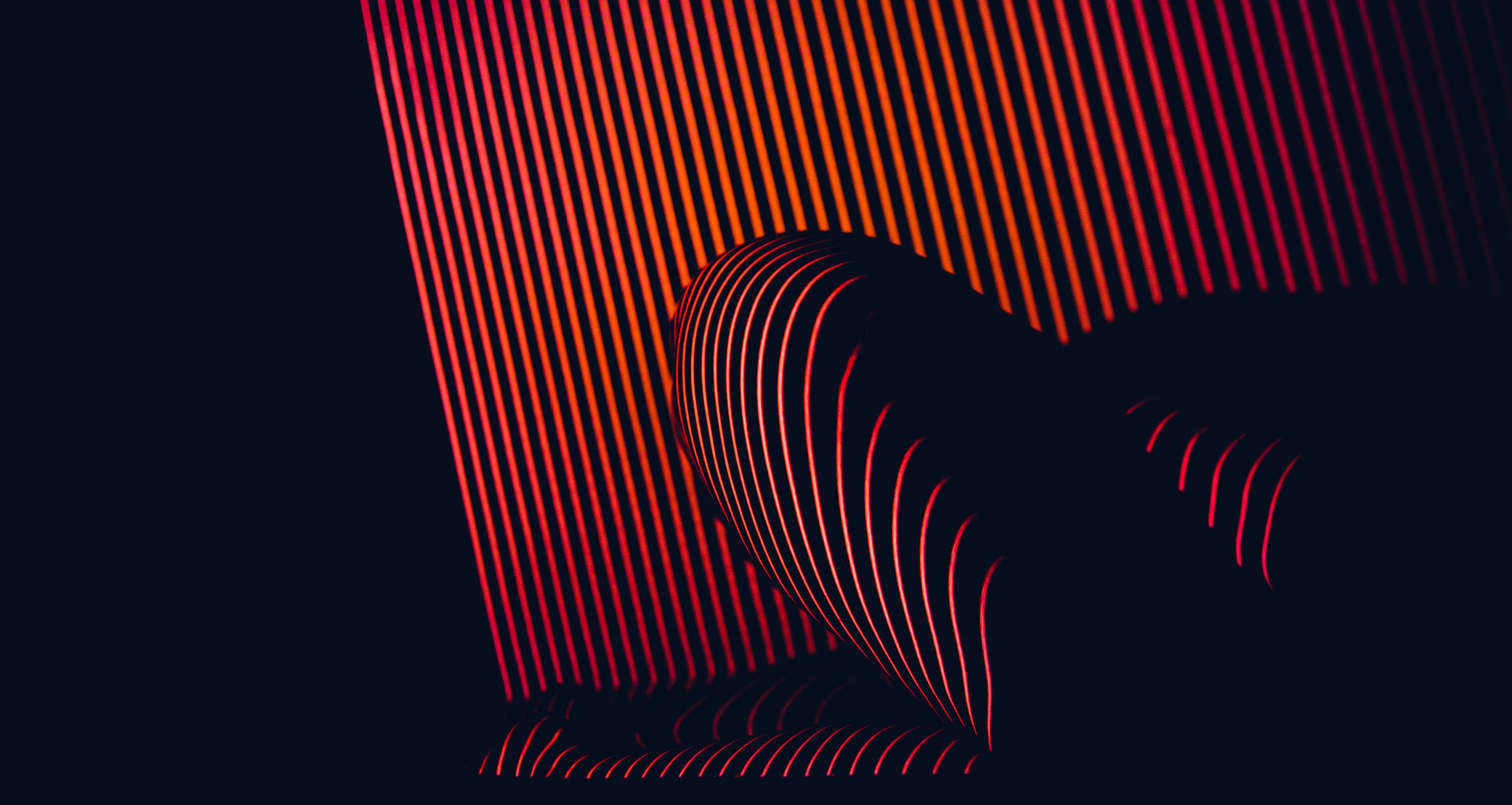 abstract-lines-of-red-and-orange-light-2026-01-07-02-26-56-utc.jpg
