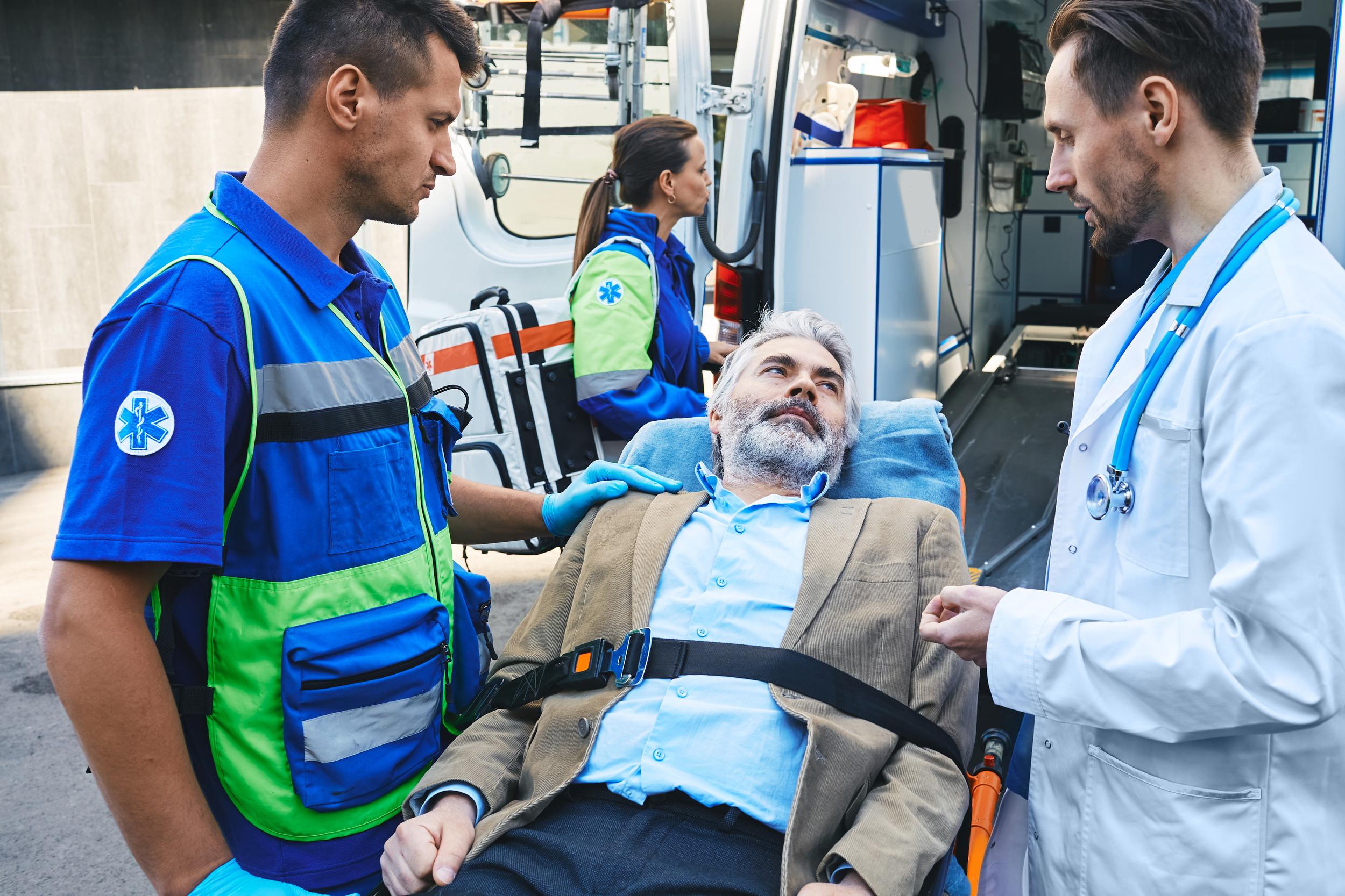 paramedic-and-doctor-examining-of-senior-male-pati-2026-03-24-03-23-40-utc.jpg
