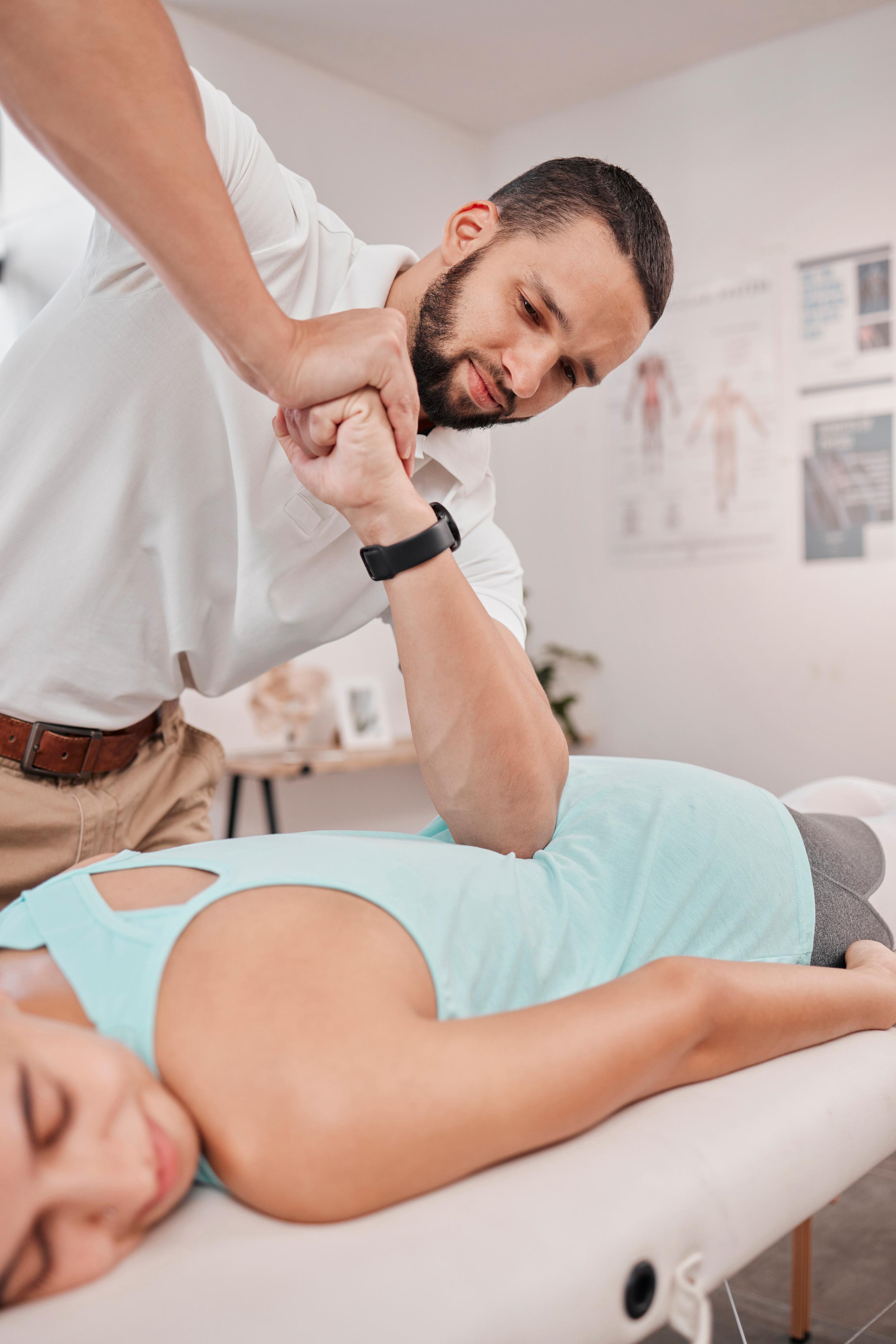 chiropractor-adjusting-woman-s-arm-in-treatment-ro-2026-03-25-03-30-50-utc.jpg