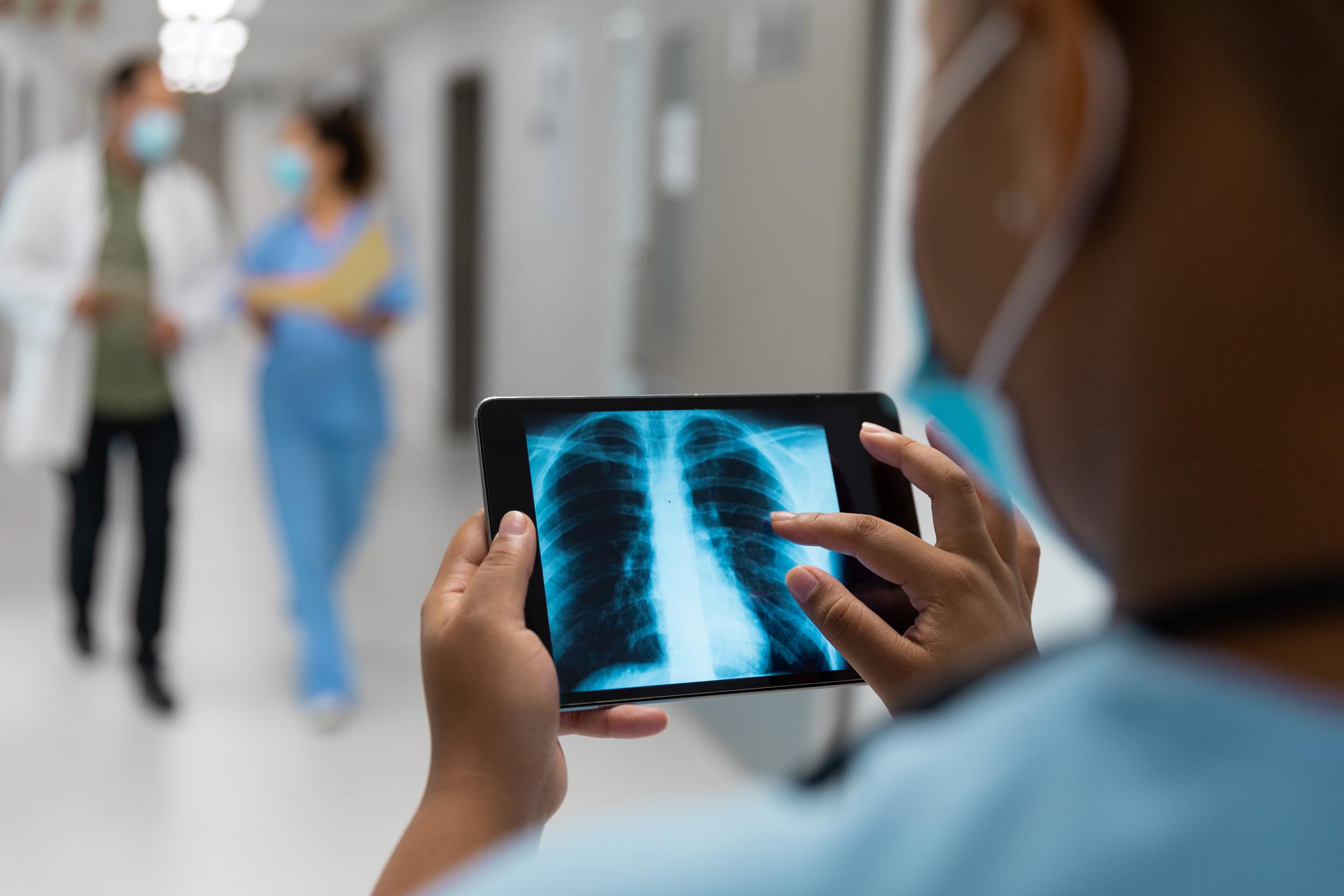 medical-professional-examining-x-ray-on-tablet-in-2026-03-25-00-54-59-utc.jpg