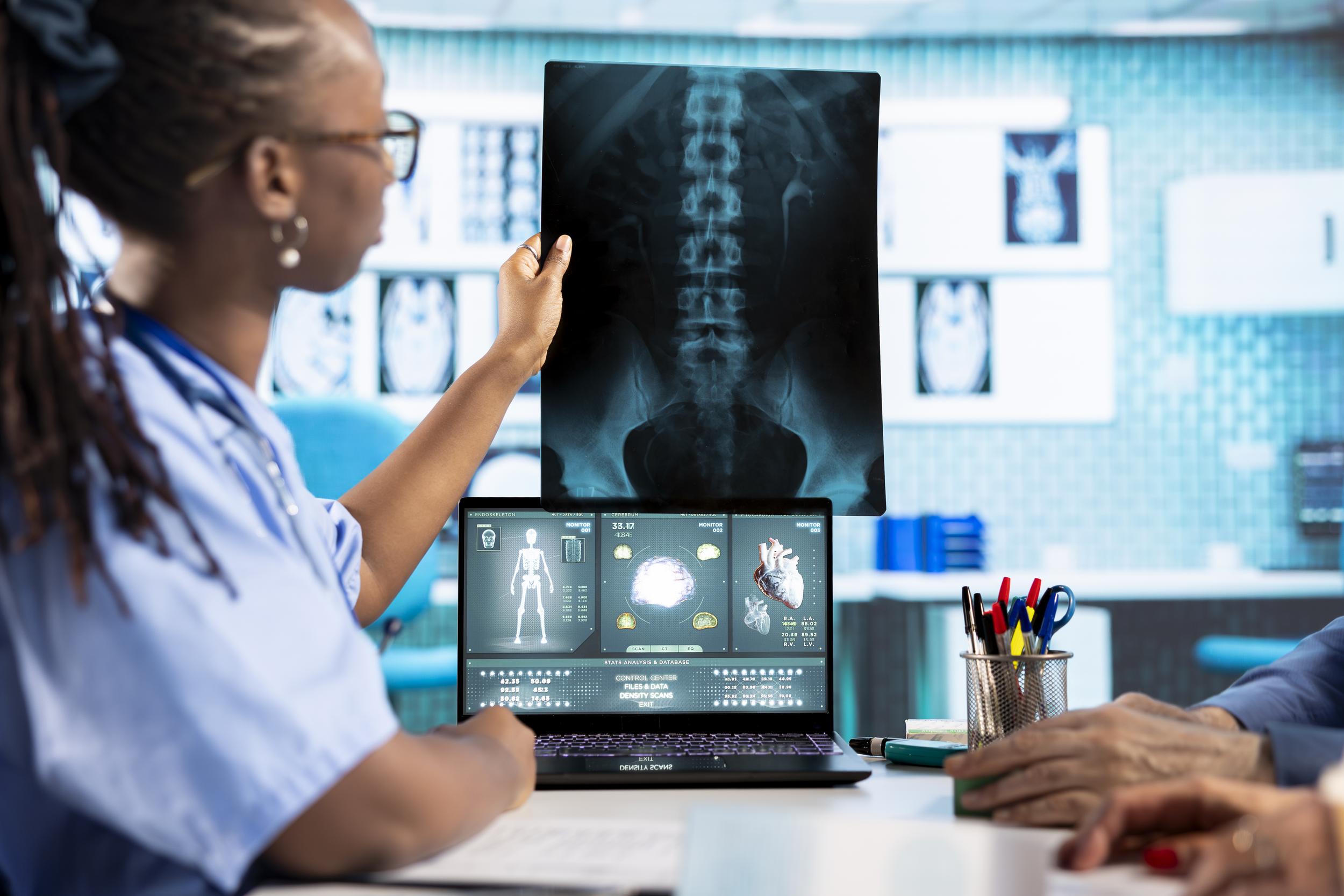 doctor-reviews-x-ray-in-medical-office-2026-01-11-10-56-17-utc.jpg