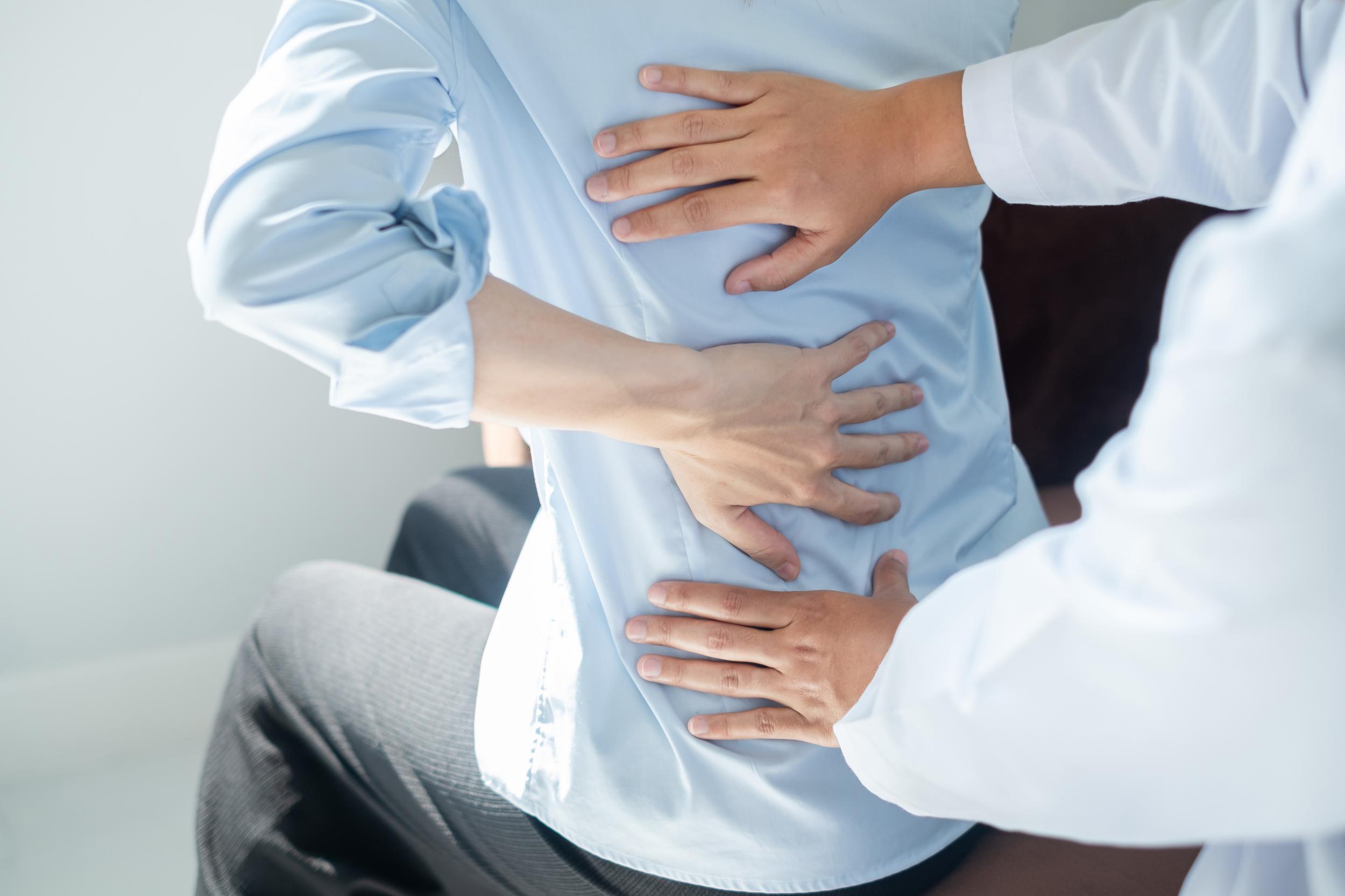 examination-of-lower-back-by-medical-professional-2026-03-17-17-47-13-utc.jpg