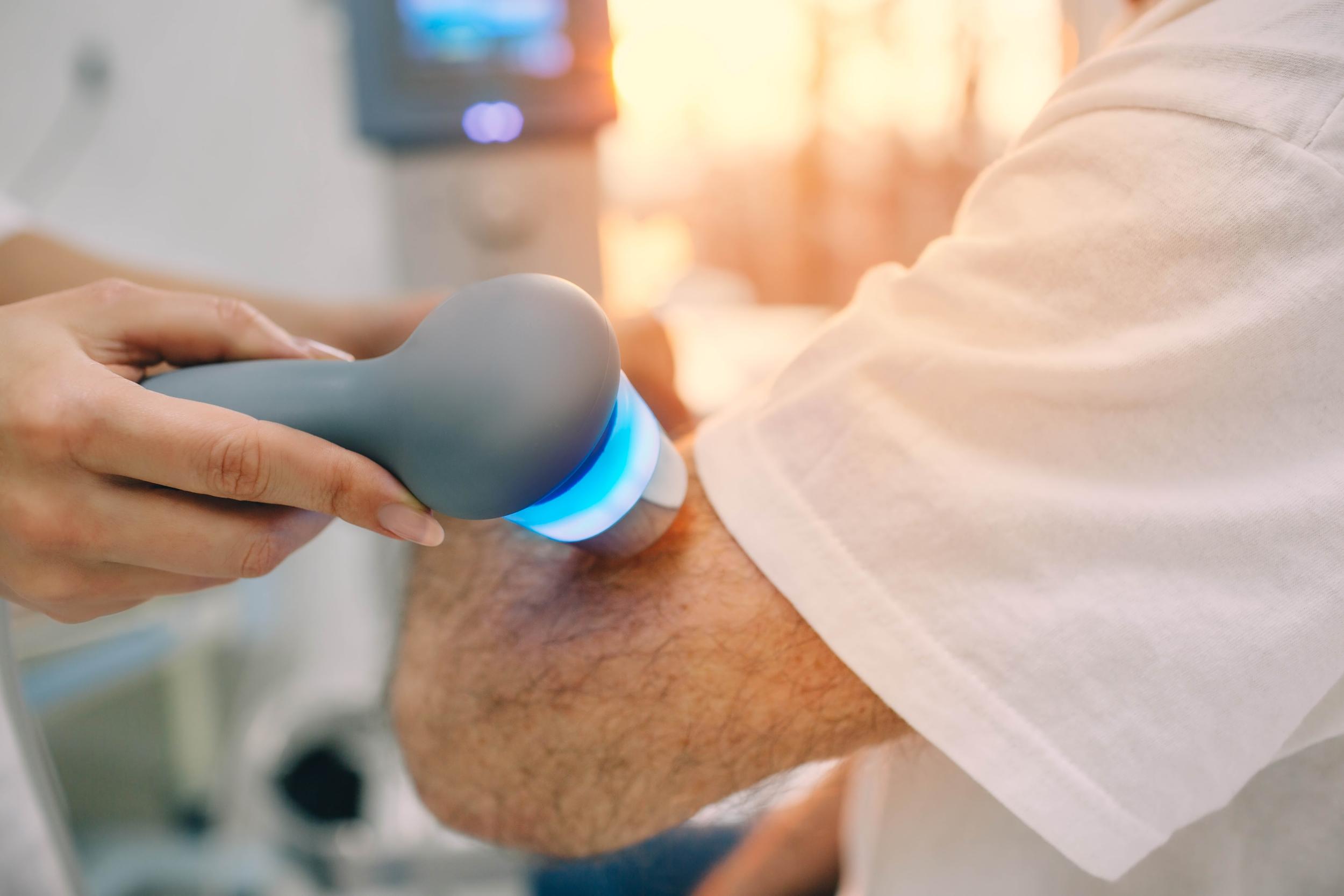 physiotherapist-using-ultrasound-machine-on-hand-o-2026-03-25-08-41-26-utc.jpg
