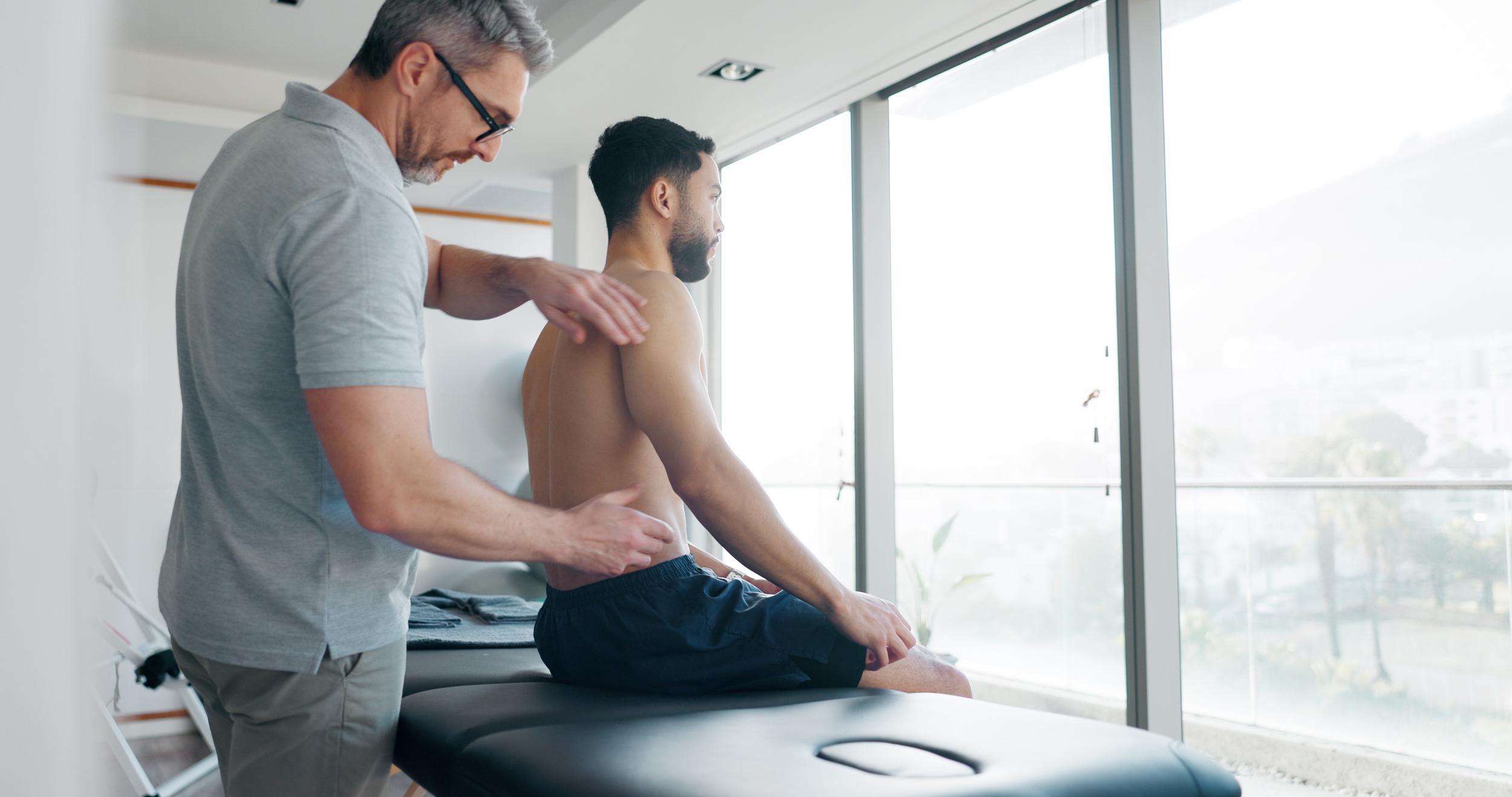 consulting-physiotherapy-and-back-pain-with-peopl-2026-03-25-05-53-18-utc.jpg