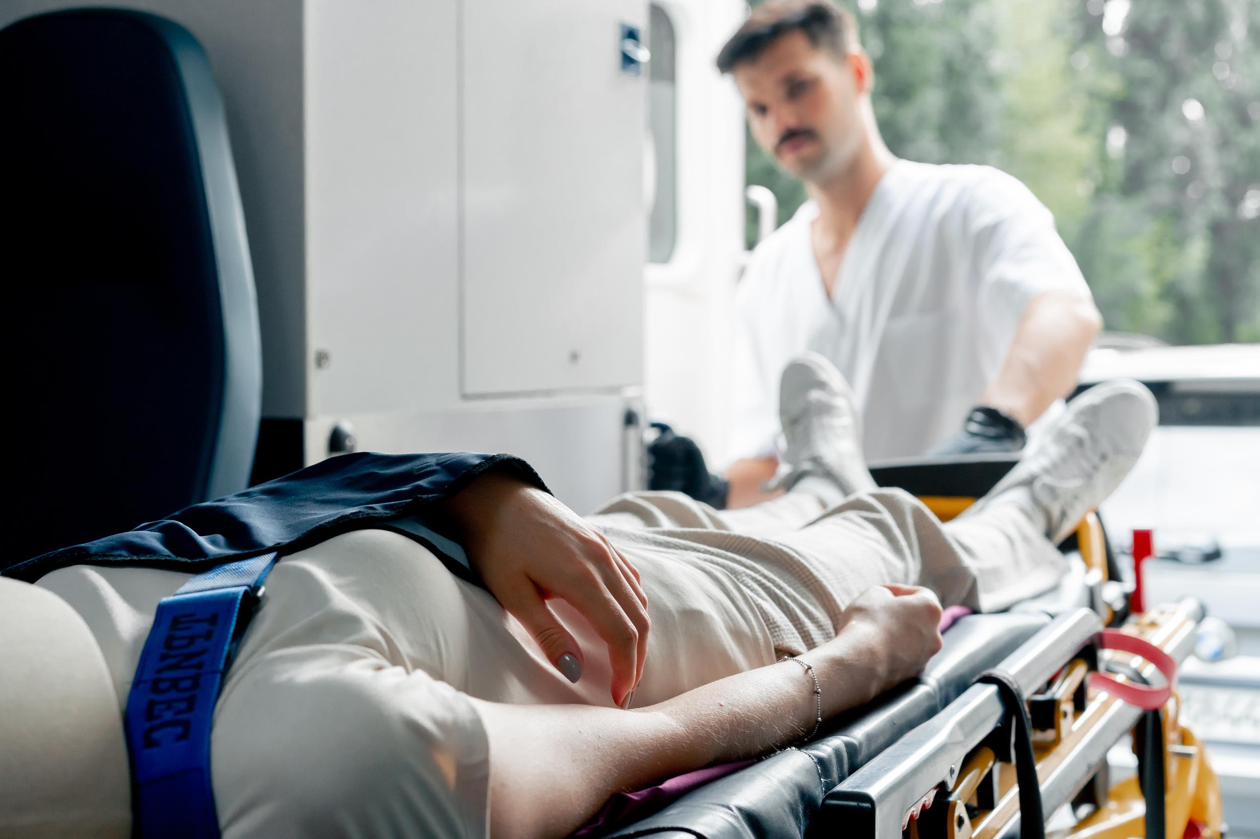 close-up-on-the-street-in-an-ambulance-a-young-pat-2026-03-16-01-25-20-utc.jpg