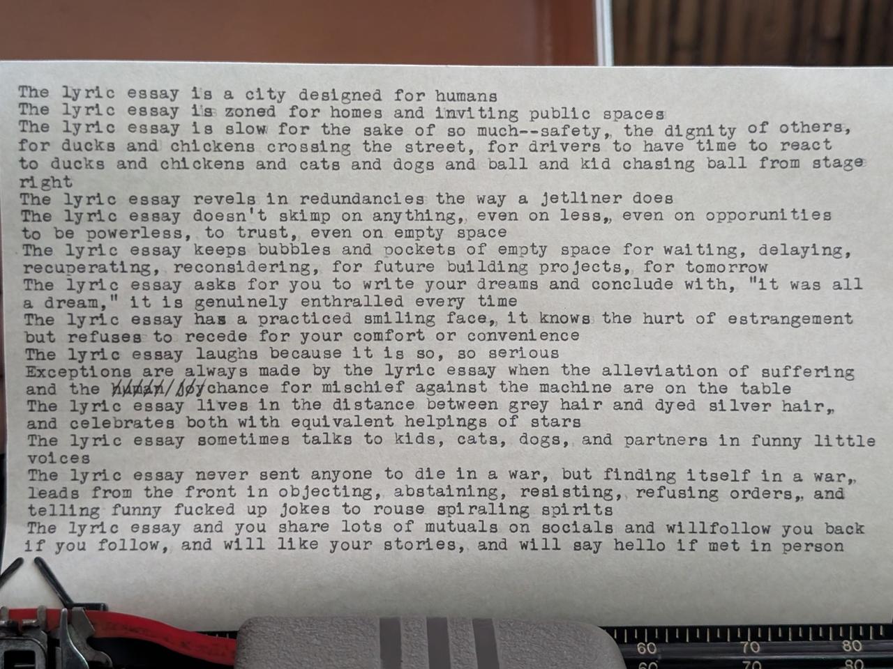 Original typewritten poem The lyric essay is a city designed for humans by Chris the Poet
