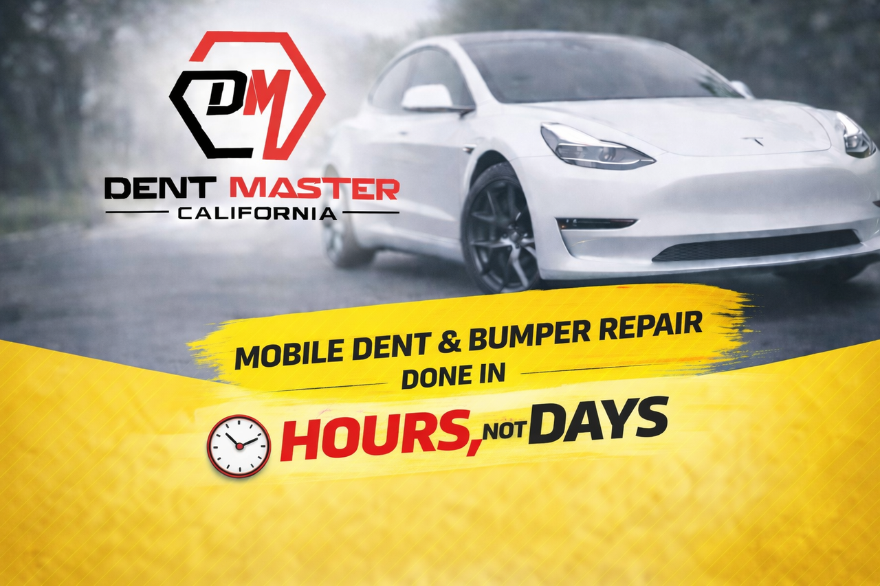 Technician performing dent repair