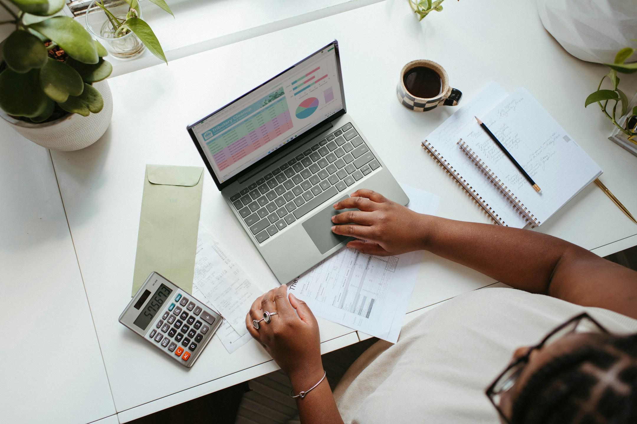A young business owner working on a business financial plan