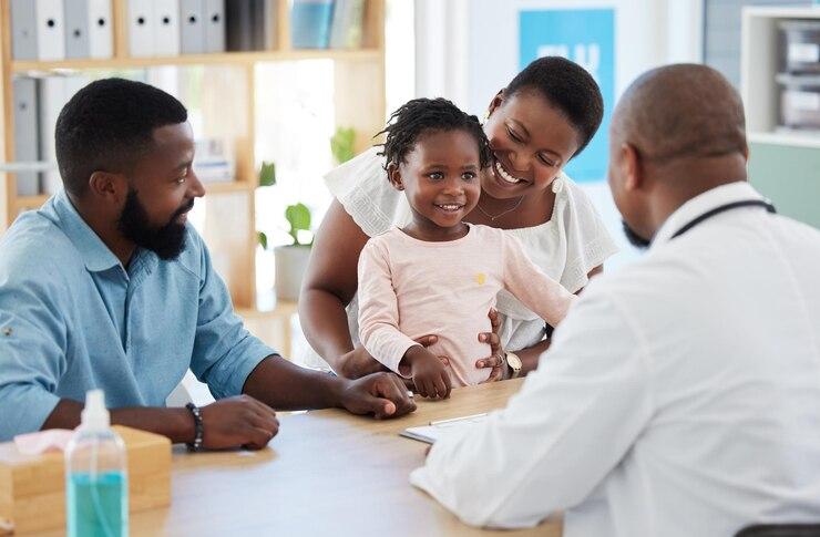 black-family-girl-consulting-doctor-hospital-healthcare-medical-room-with-mother-father-kids-smile-happy-trust-with-pediatrician-employee-worker-children-medicine-support_590464-80740.jpg