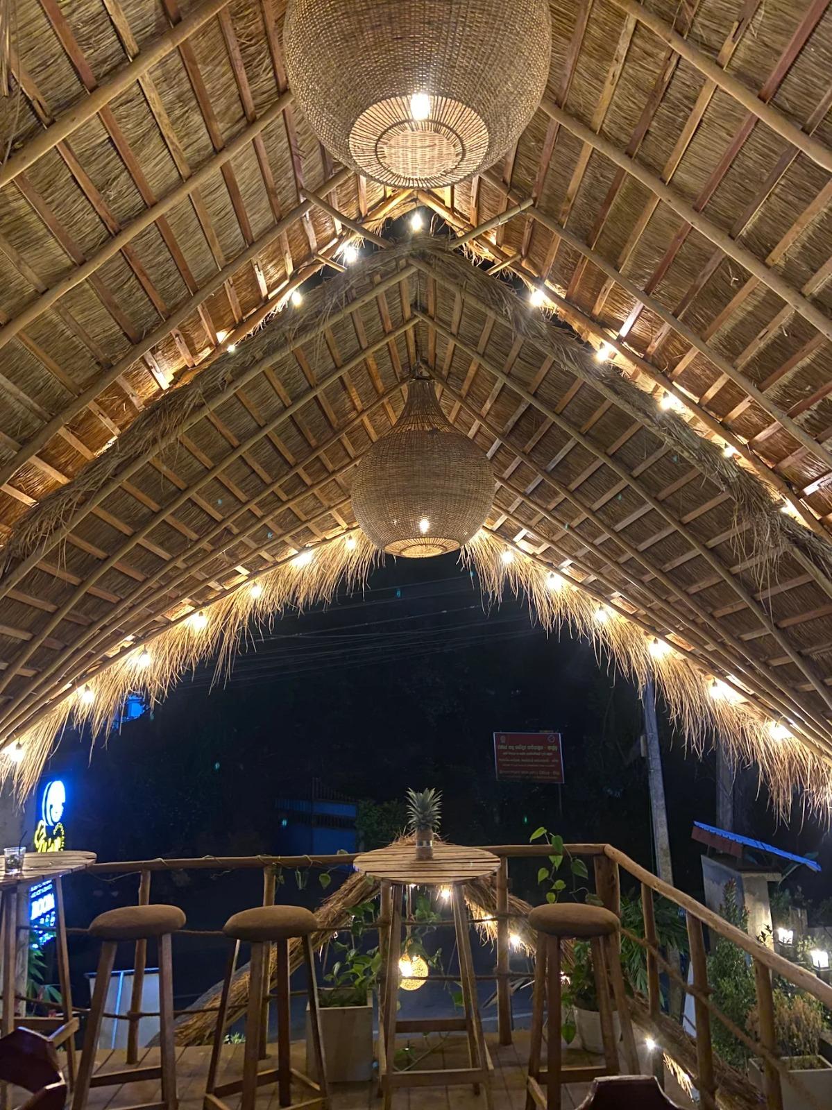 Tropical restaurant interior with warm lighting