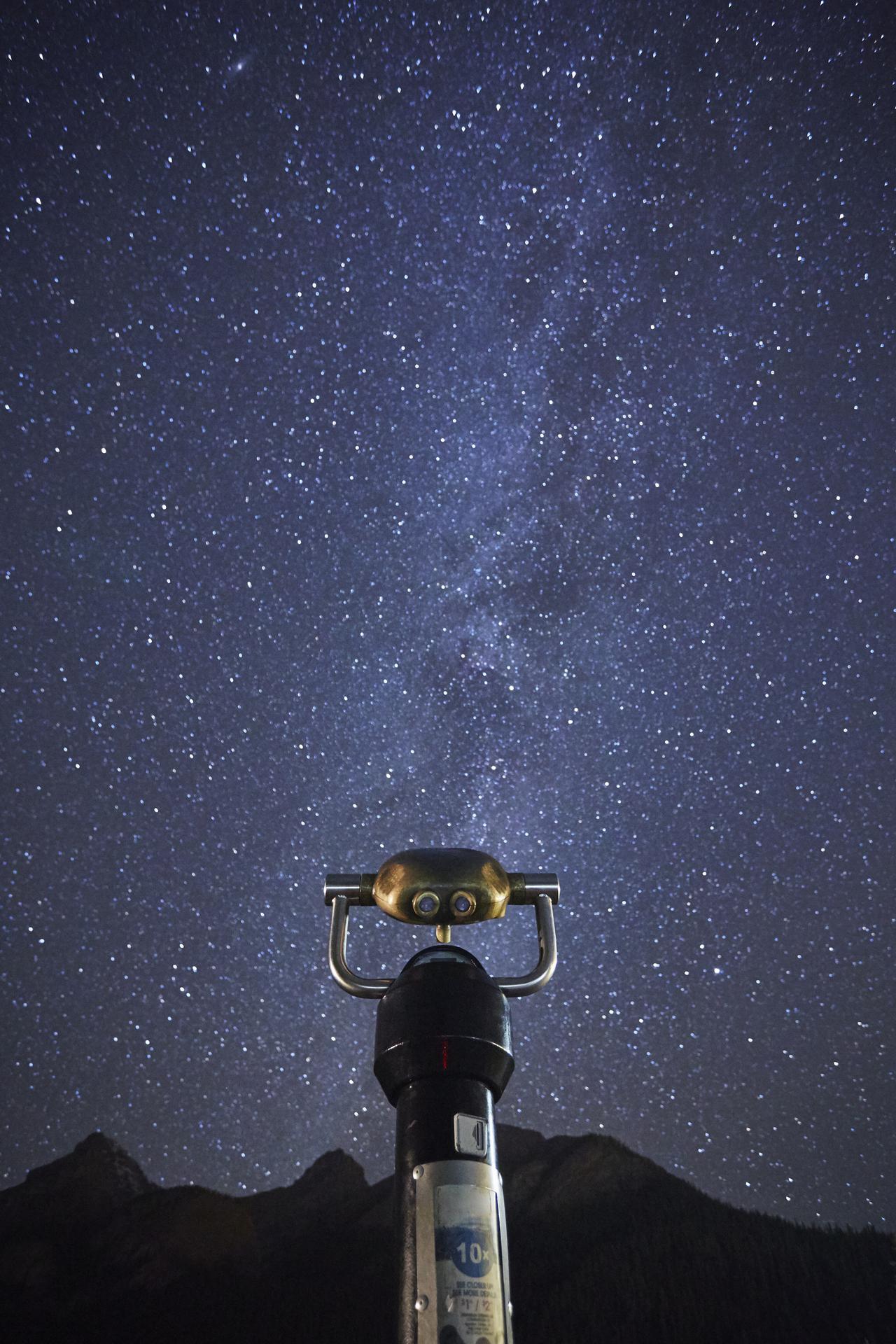 stargazing-through-a-telescope-under-a-starry-nigh-2025-04-04-06-44-23-utc.jpg
