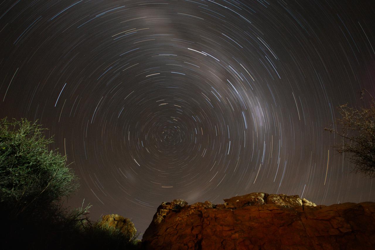 rock-formations-with-star-trails-2024-12-05-19-16-38-utc.jpg