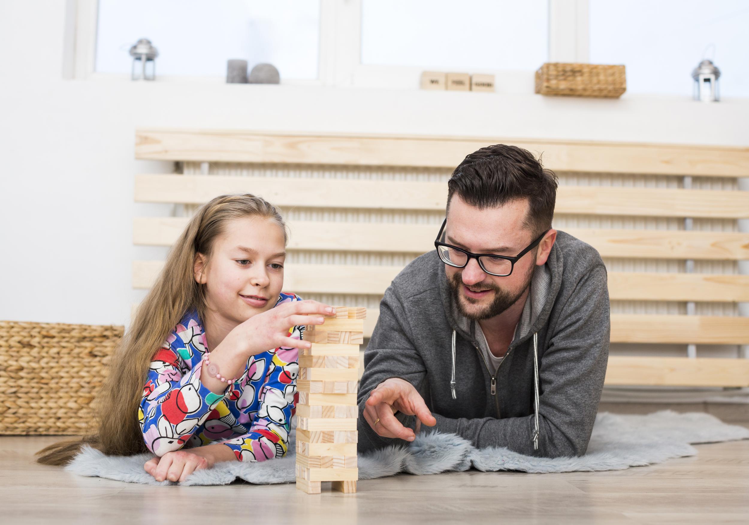 father-daughter-playing-with-wood-blocks.jpg