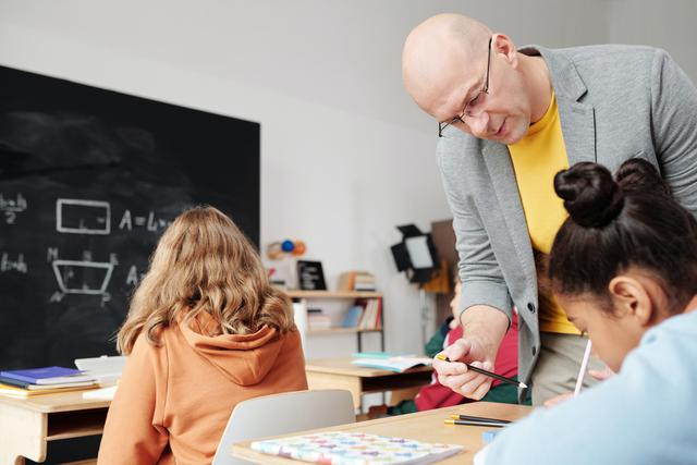 This is an image of children using downloadable math workbooks.