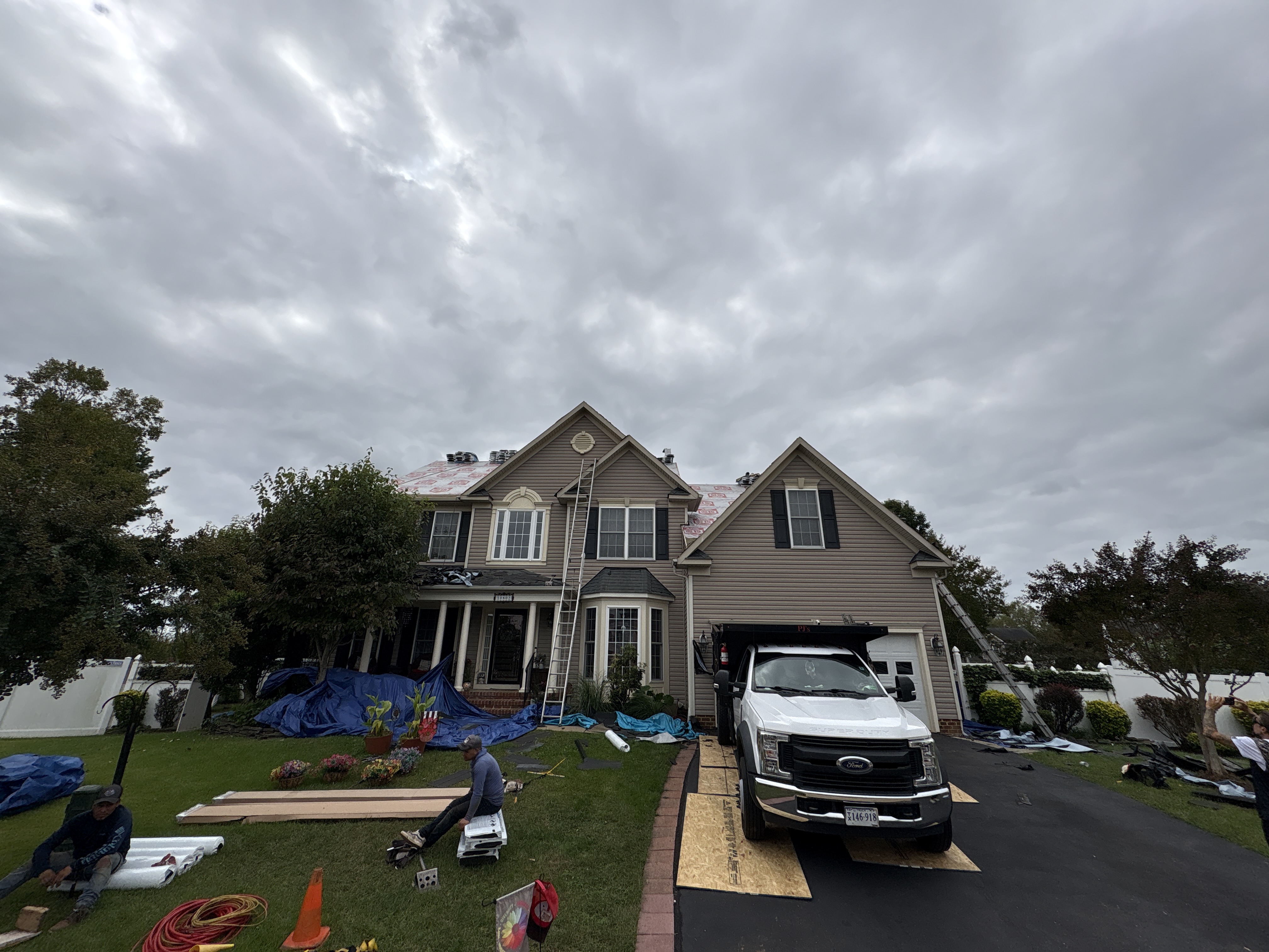 Prestige crew and equipment set up for a roof project