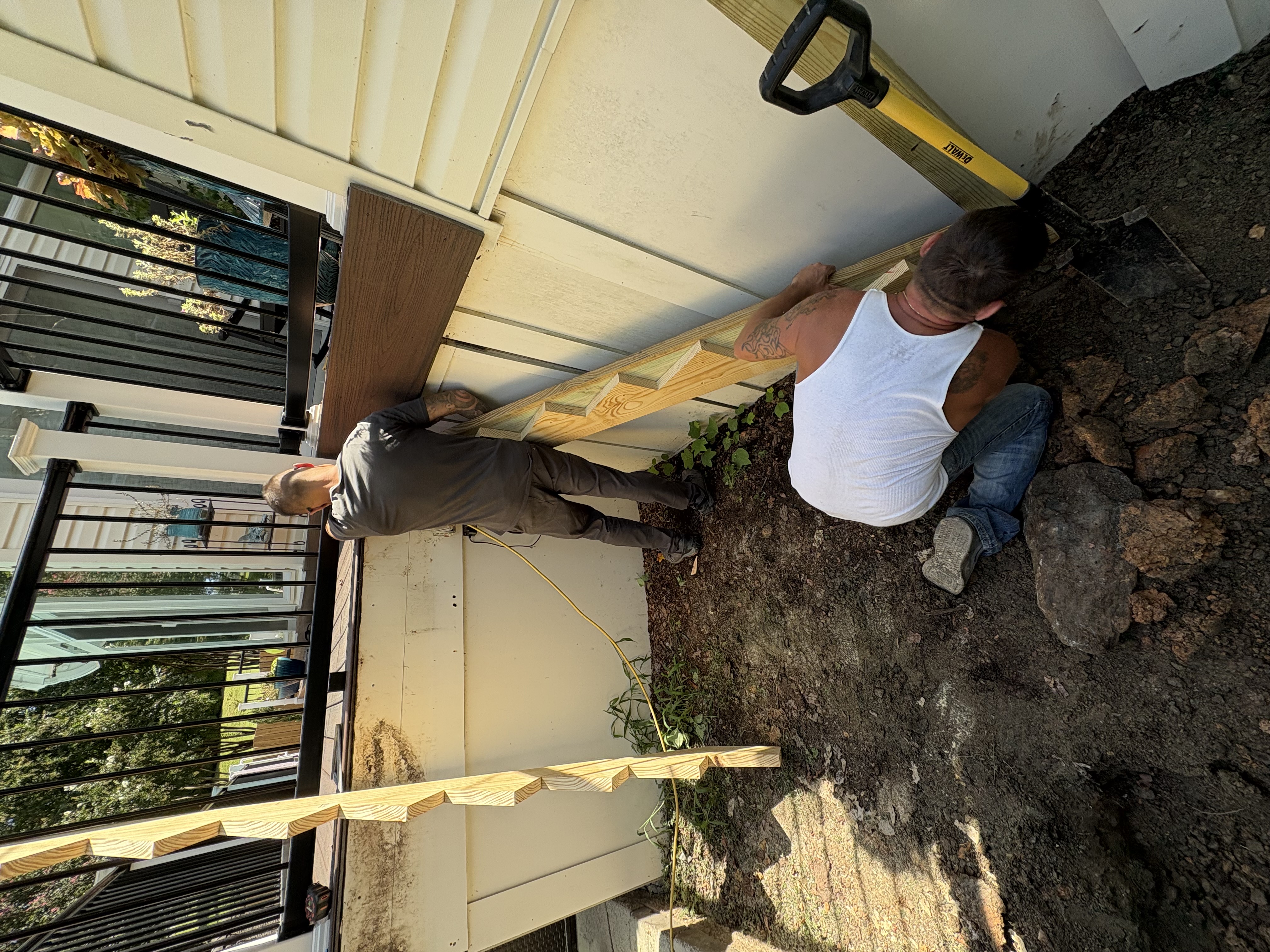 Crew framing a new backyard deck
