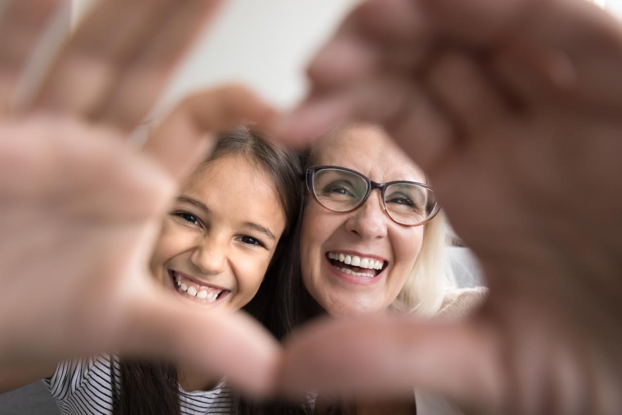 Familia sonriendo - Seguro dental