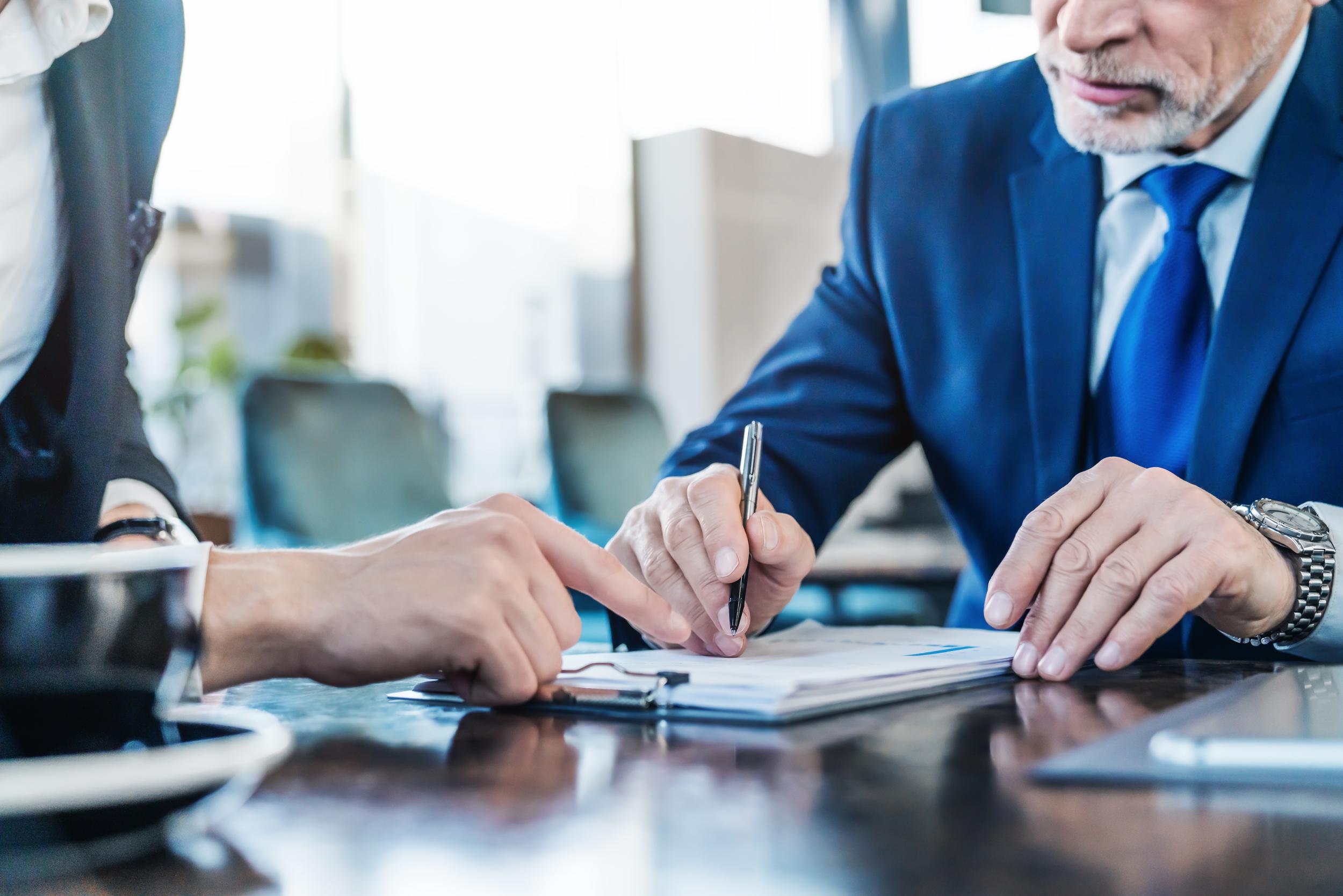 cropped-image-of-businessman-showing-his-partner-s-2026-01-07-01-30-00-utc.jpg