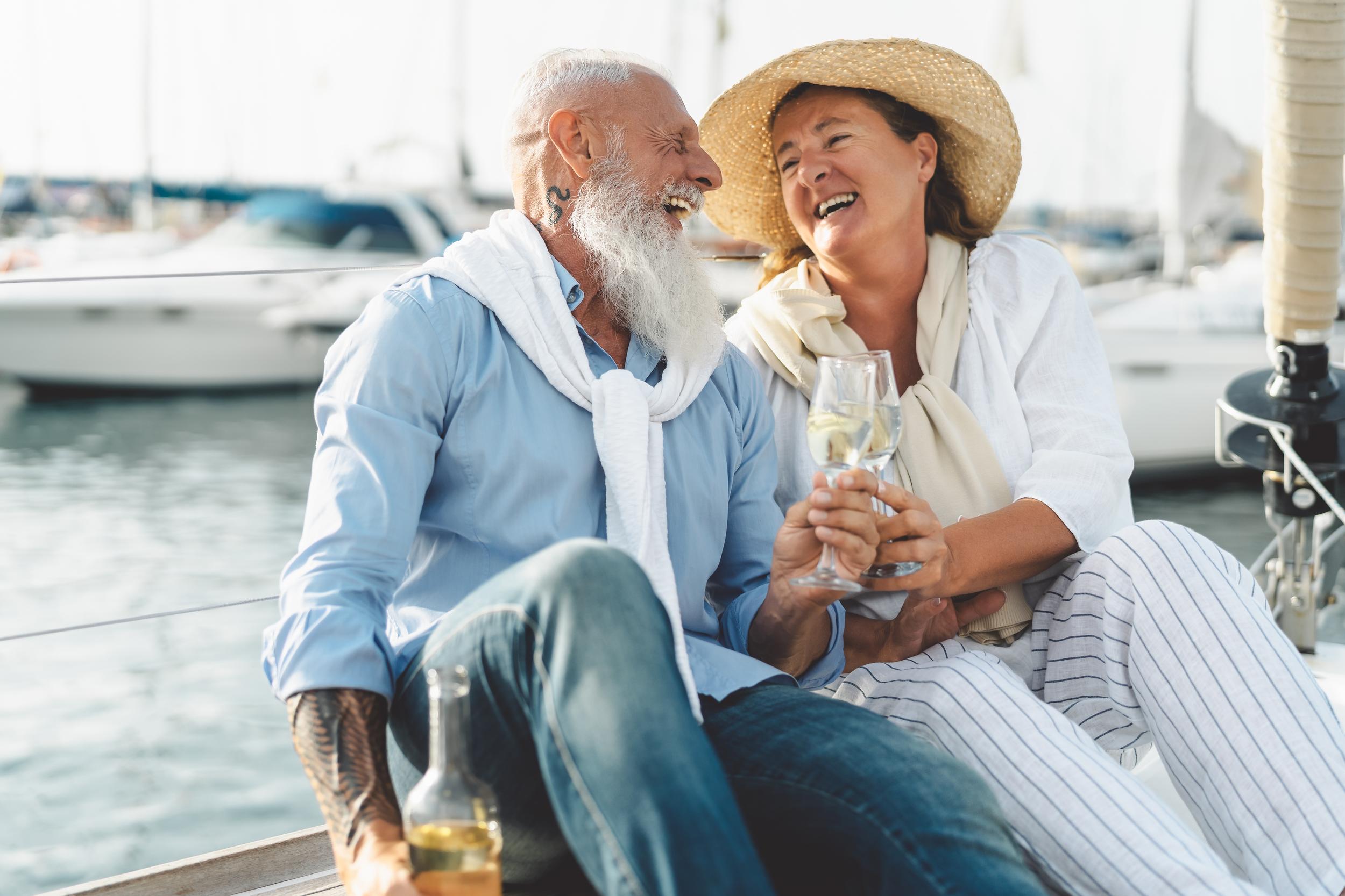 senior-couple-toasting-champagne-on-sailboat-vacat-2026-01-06-09-25-44-utc.jpg
