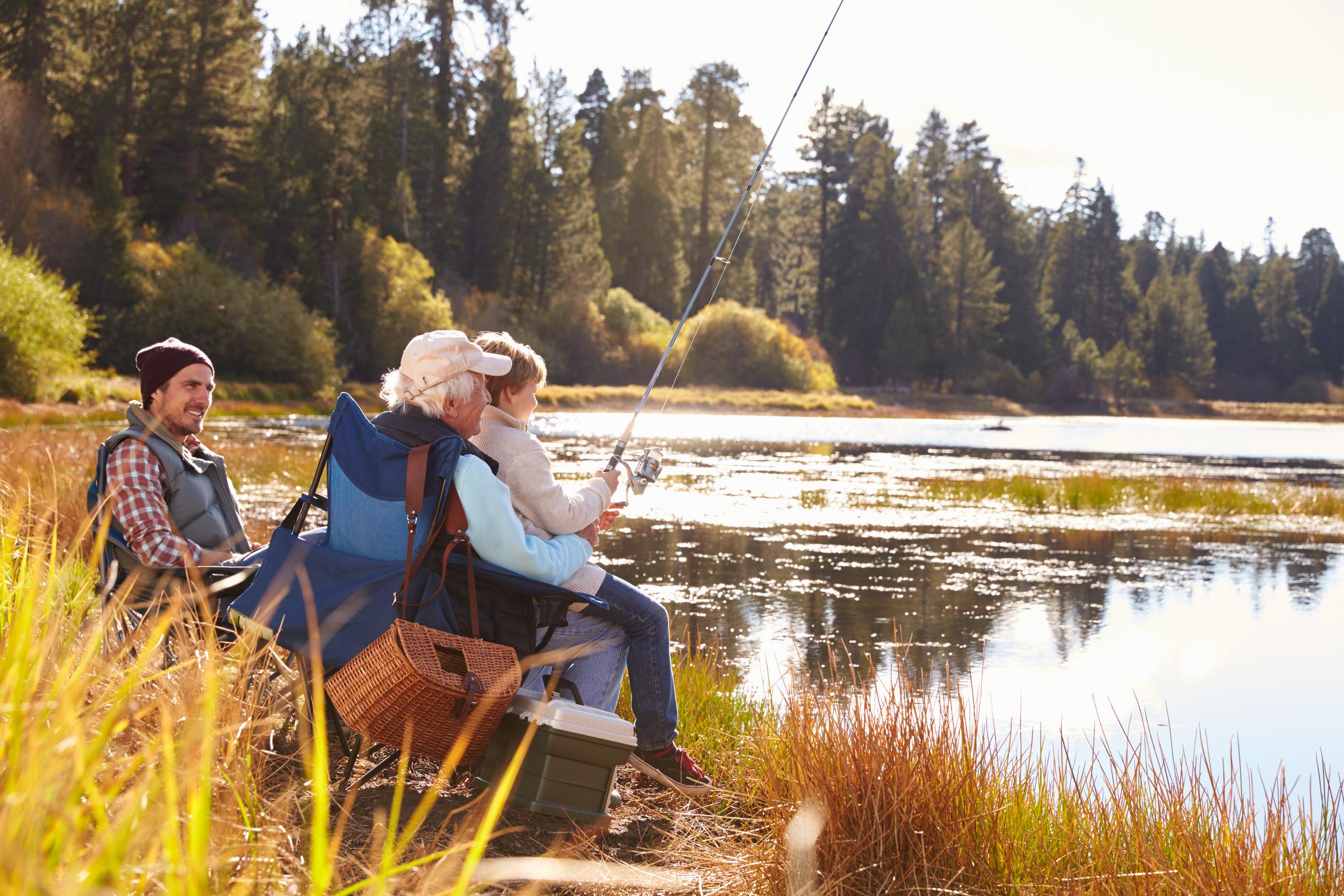 grandad-teaches-his-grandson-to-fish-at-a-lake-da-2026-03-10-04-46-28-utc.jpg