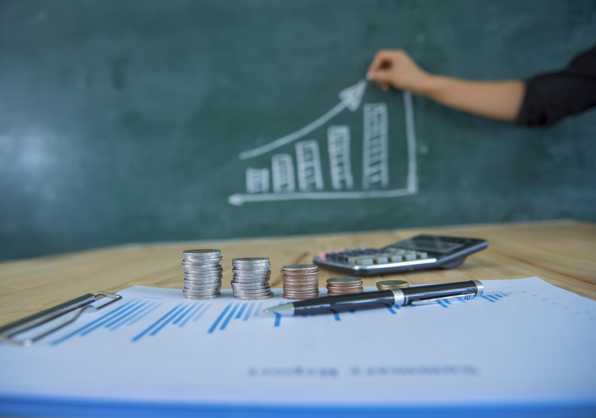 saving-money-concept-graph-stacks-of-coins-chart-2026-01-11-10-42-30-utc.jpg