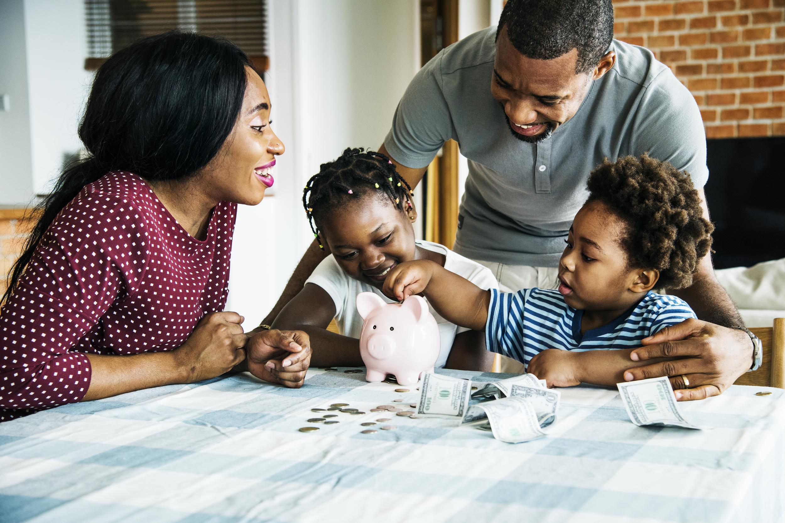 family-saving-money-in-piggy-bank-2026-01-07-23-36-18-utc.jpg