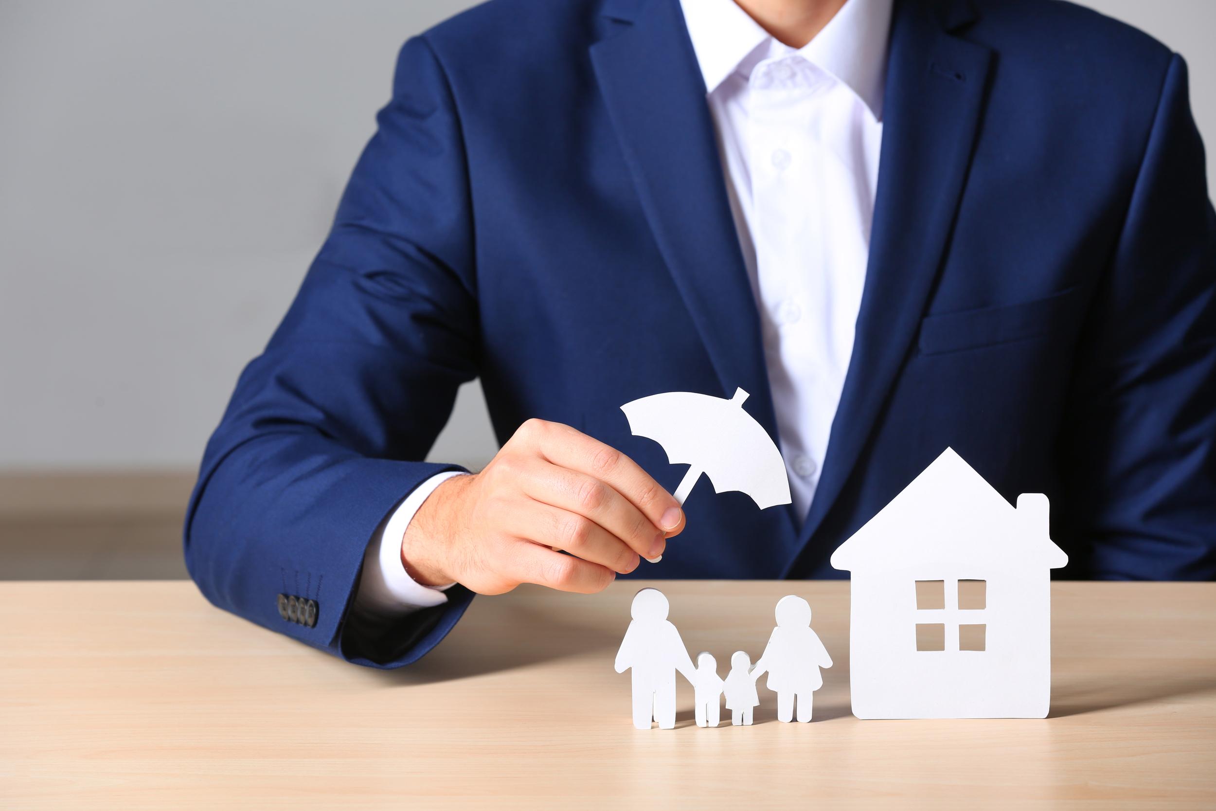 male-insurance-agent-covering-paper-family-and-hom-2026-03-05-11-32-26-utc.jpg
