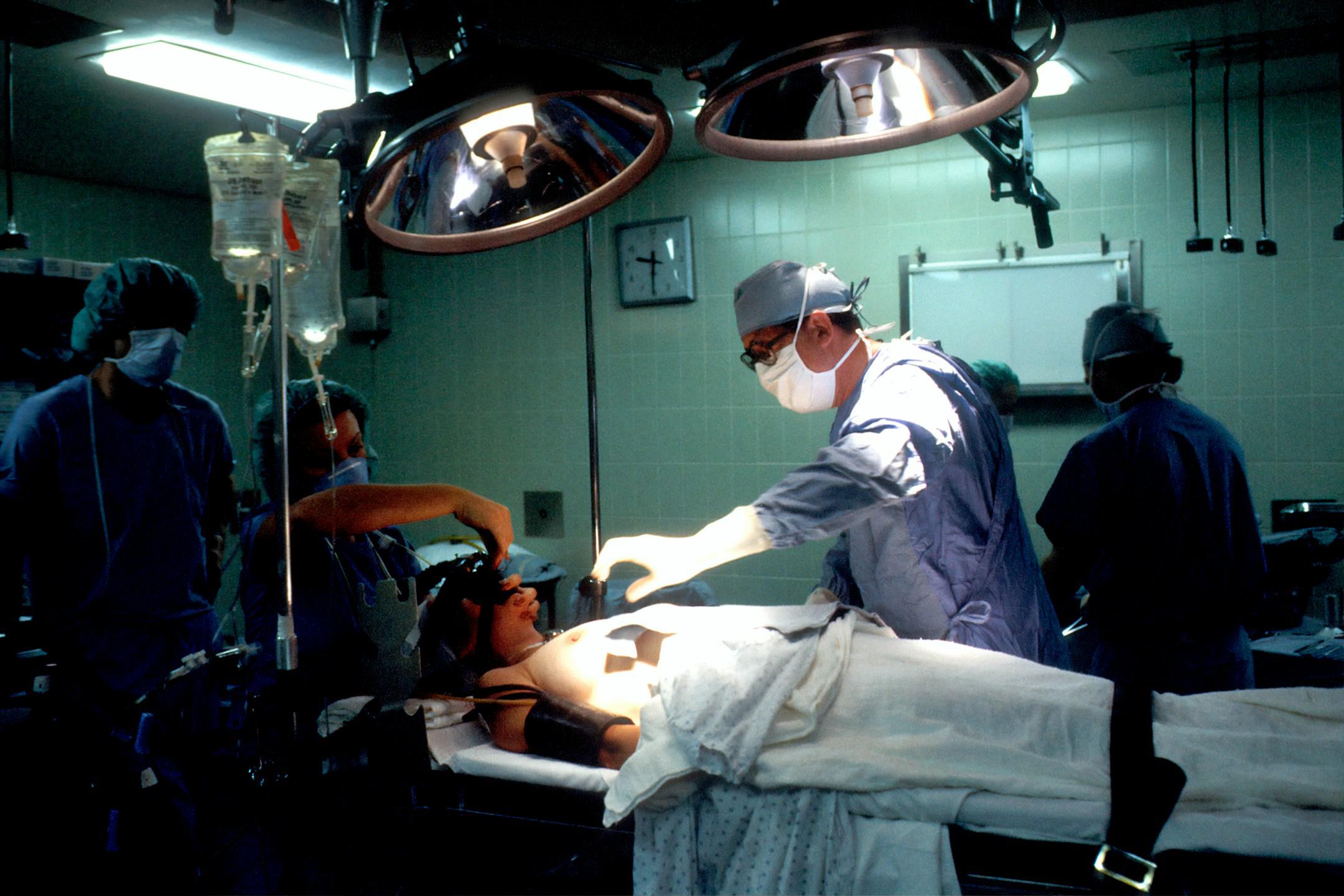 Biopsy  A Caucasian woman patient is being prepared for