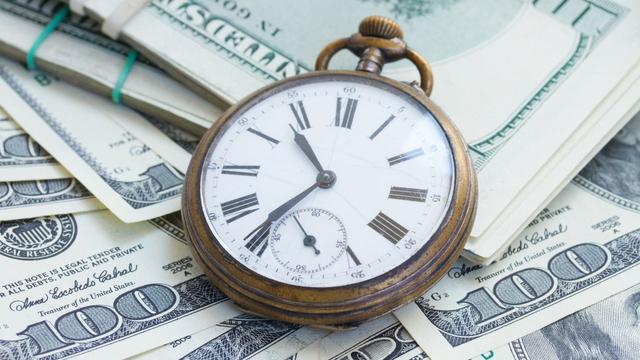 stopwatch with money.jpg