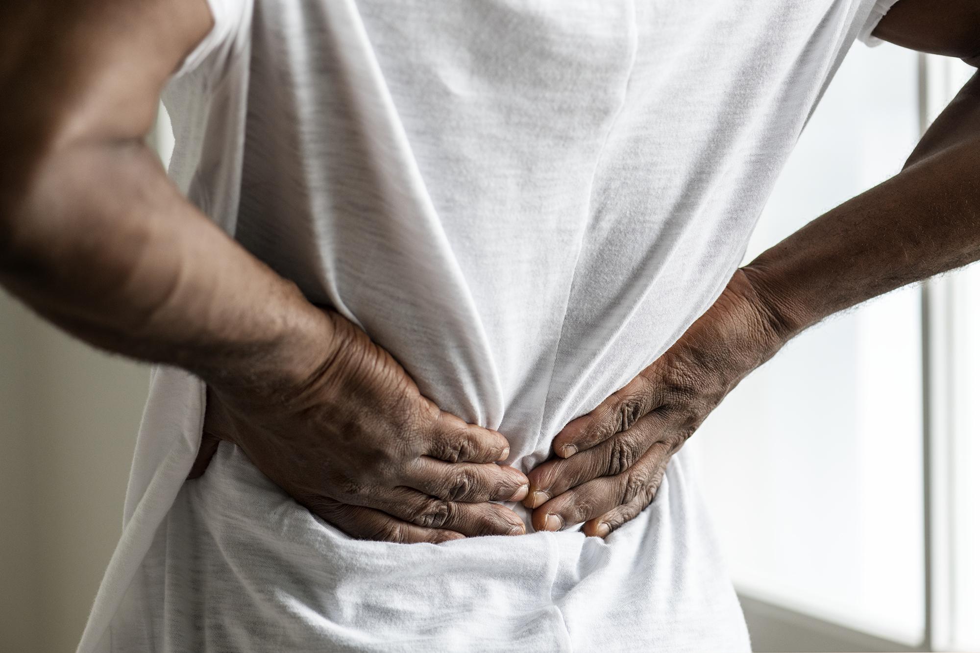 black-man-suffering-back-pain.jpg
