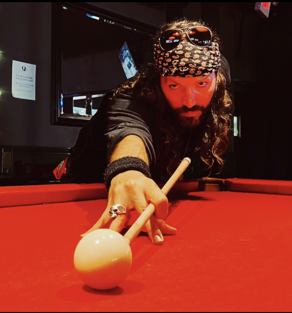 Billiard player lining up a shot