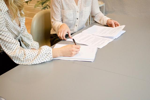 Image of a homeowner working with a home buying company to sell their property for cash.