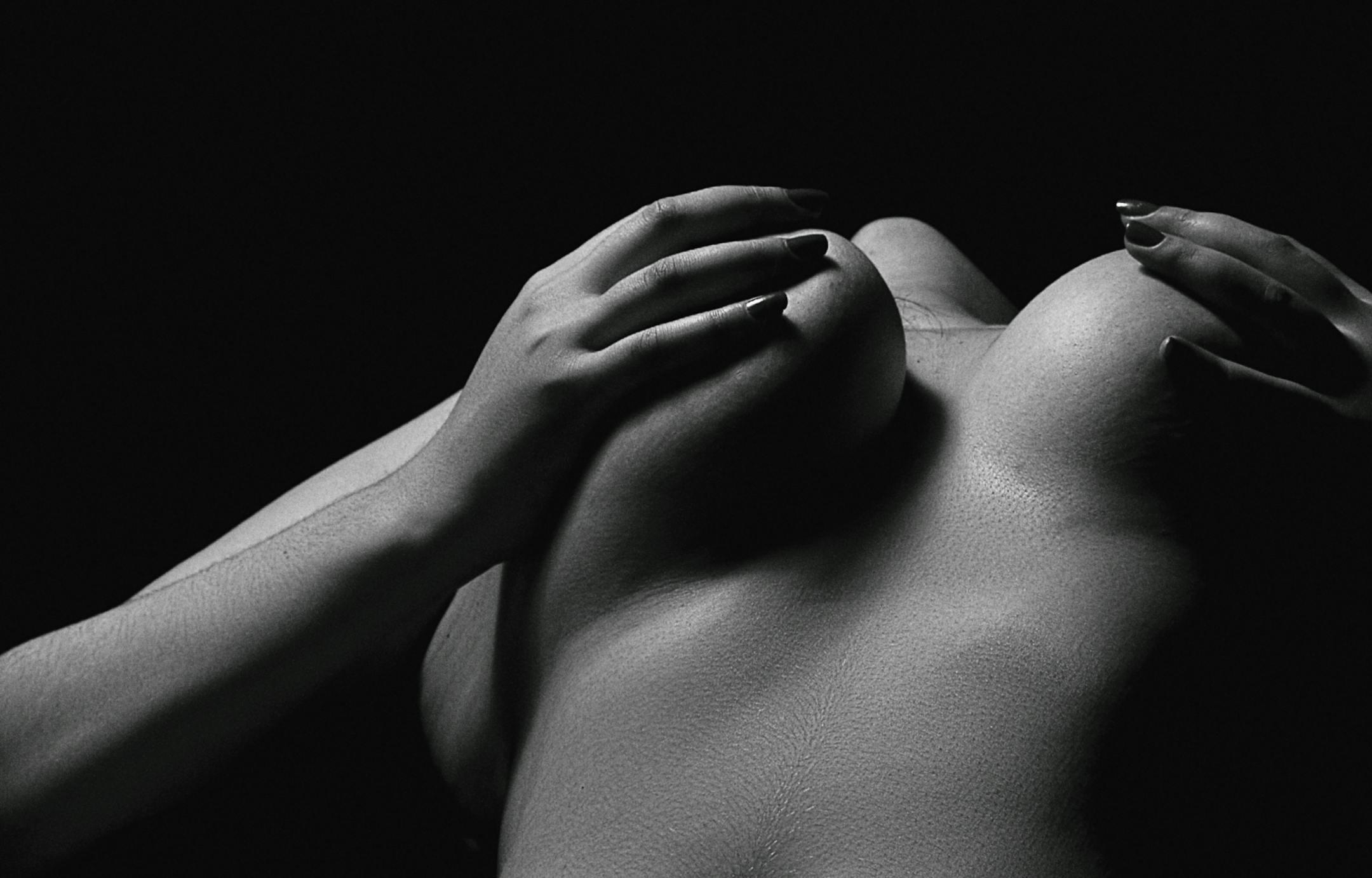 Sensual black and white artistic photograph capturing the elegance of form and texture.