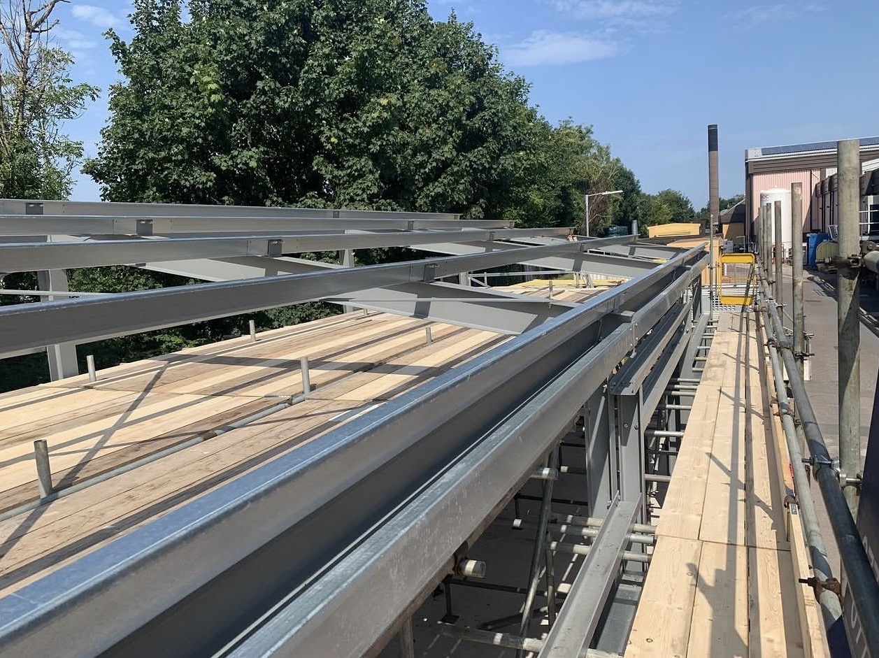 LT Scaffolding Solutions team members working on a residential property