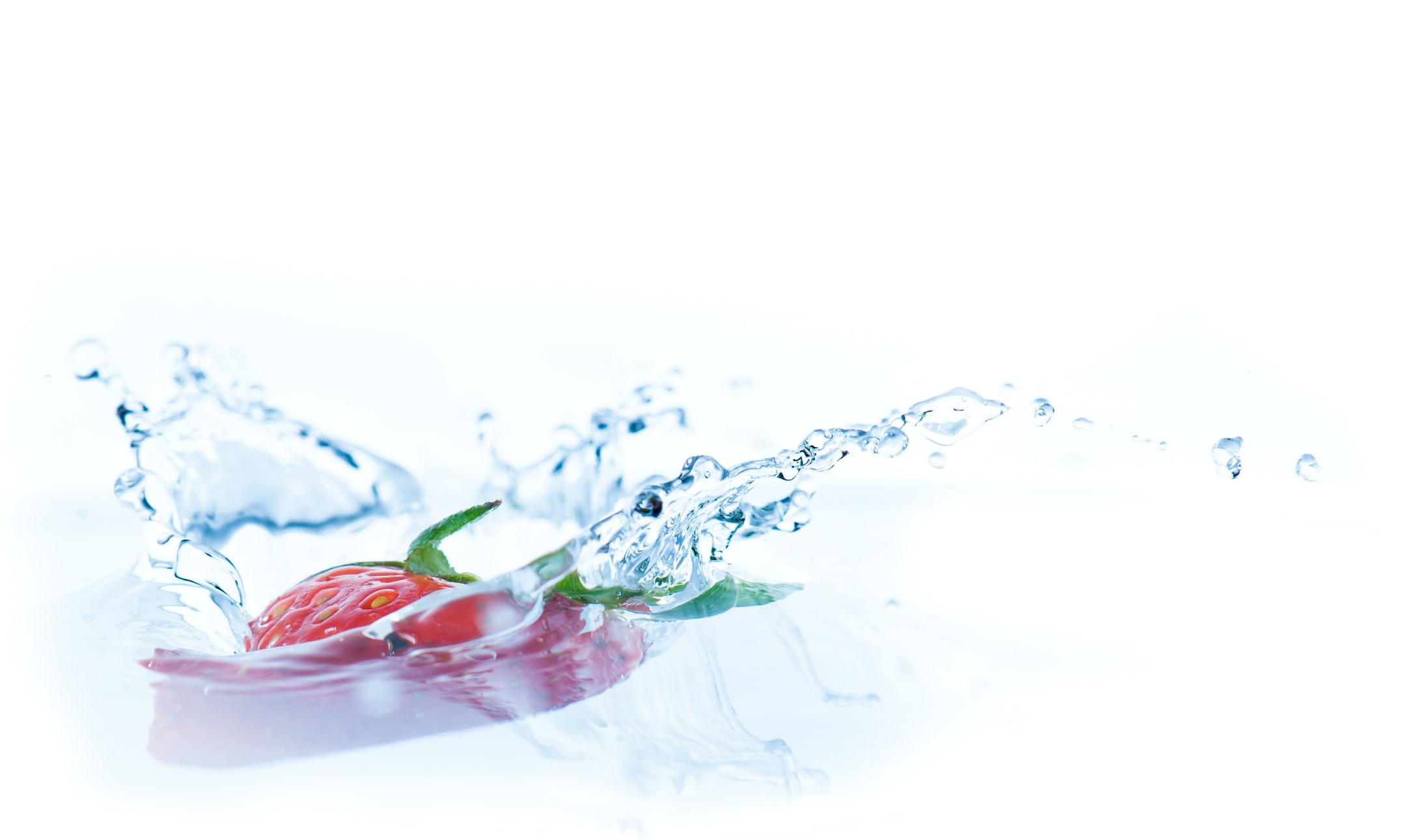 Image of fruit in a bowl of water showing the refreshing aspect of IV hydration therapy.