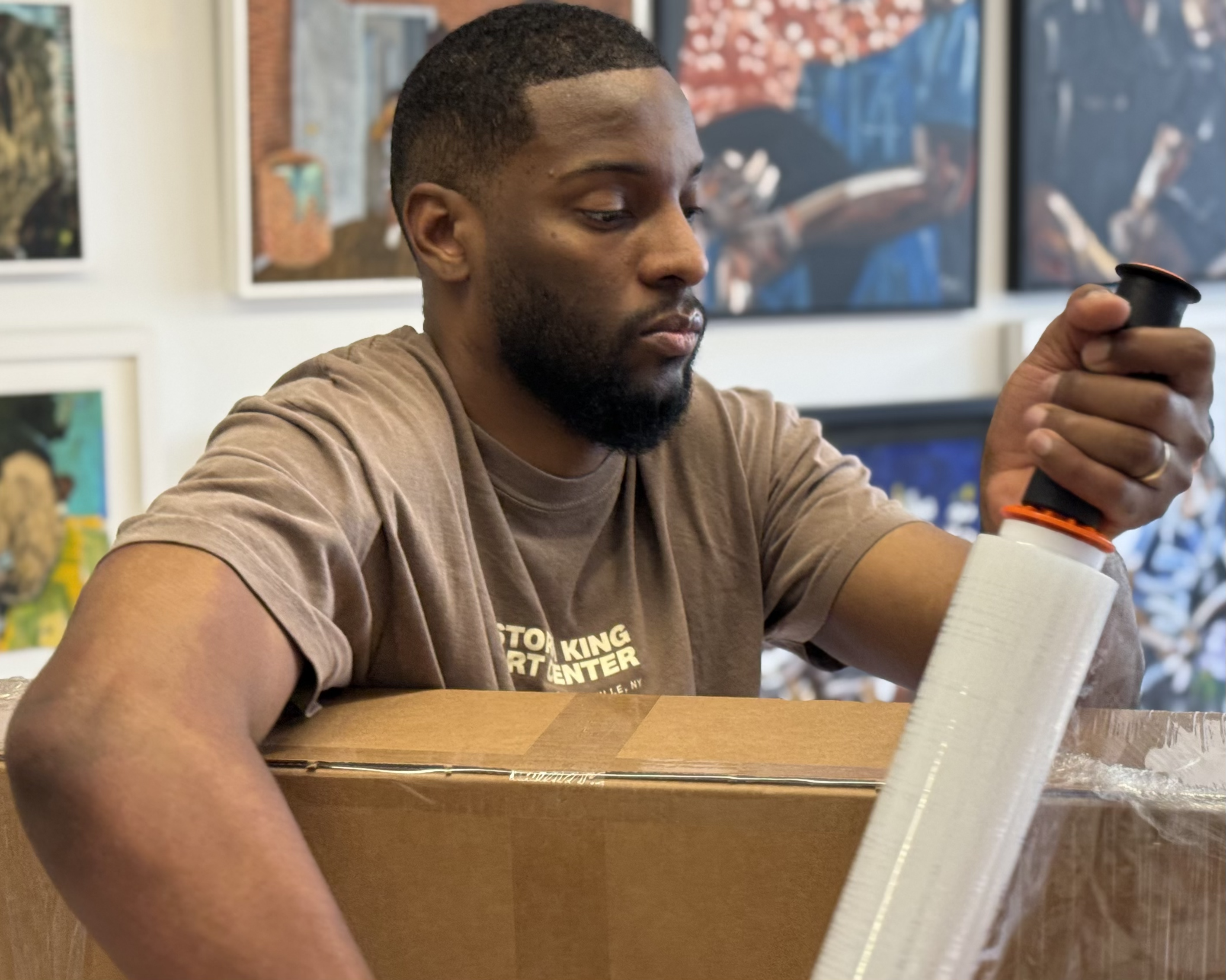 Artwork being carefully packed for transport